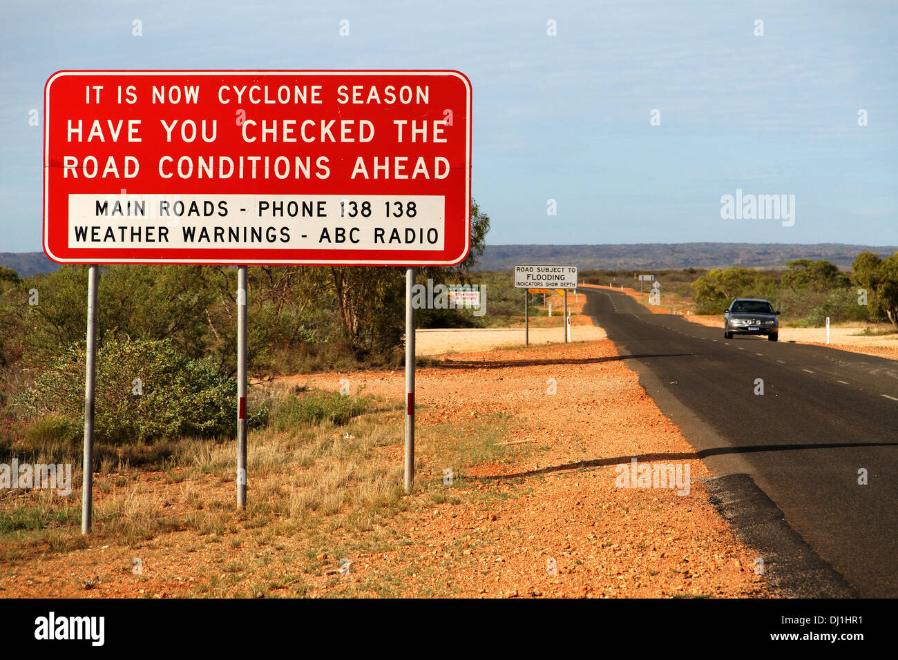 Cyclone season road warning sign, Exmouth Western Australia Stock Photo