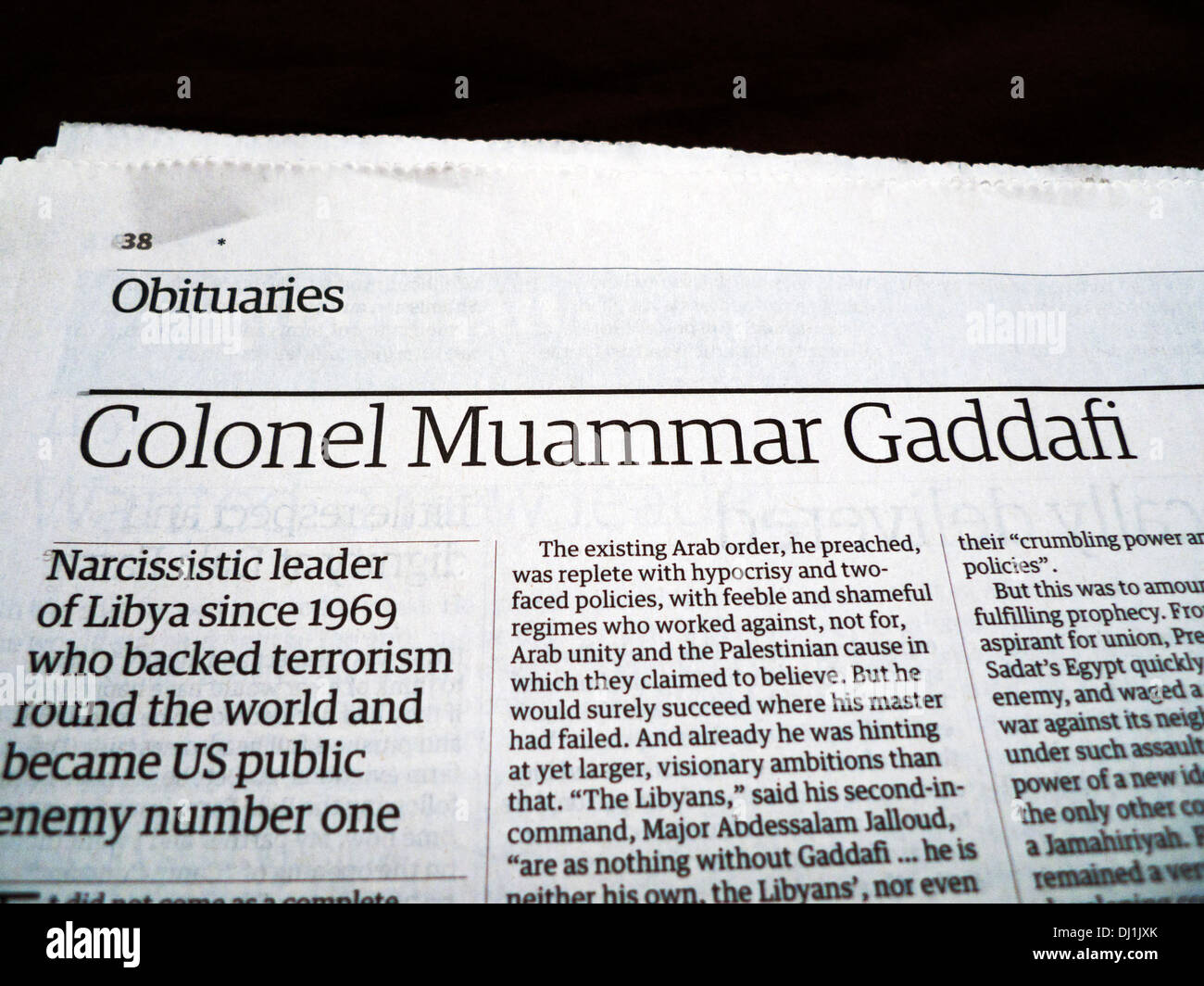 'Colonel Muammar Gaddafi' obituary article in Guardian newspaper  October 2011 London England UK Stock Photo