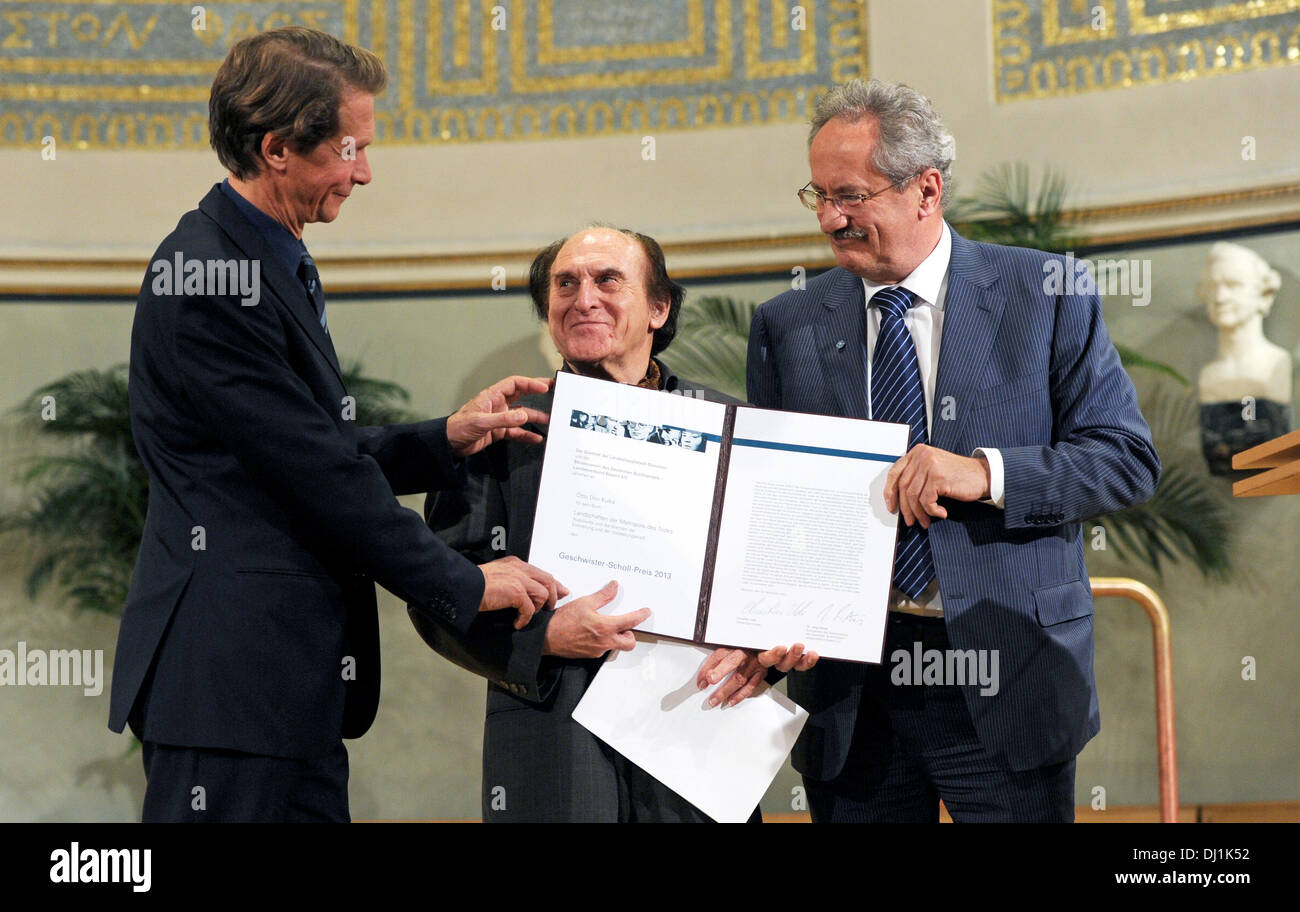 Israeli historian and Holocaust survivor Otto Dov Kulka (C) is flanked by Munich's mayor Christian Ude (SPD, R) and Joerg Platiel (L), chairman of the 'Boersenverein des Deutschen Buchhandels', the German trade association for the print publishing industry', as they hand the award document to Kulka during the award ceremony for the  Geschwister-Scholl-Prize at the Ludwig-Maximilians-University in Munich, Germany, 18 November 2013. Otto Dov Kulka was awarded the  Geschwister-Scholl-Prize for his recent book 'Landscapes of the Metropolis of Death: Reflections on Memory and Imagination'. Photo: T Stock Photo