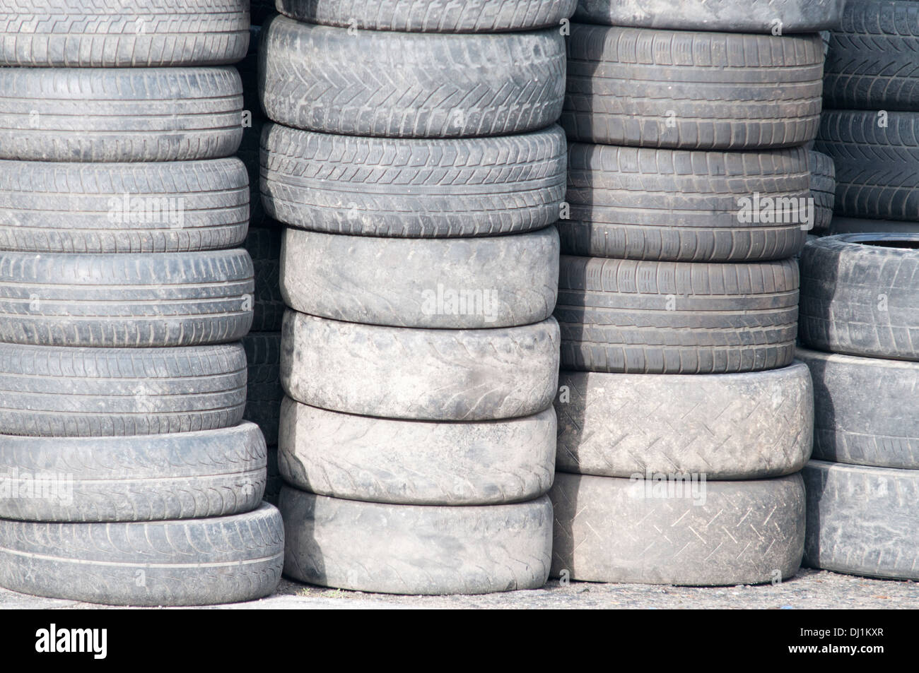 background with old tires on each other Stock Photo