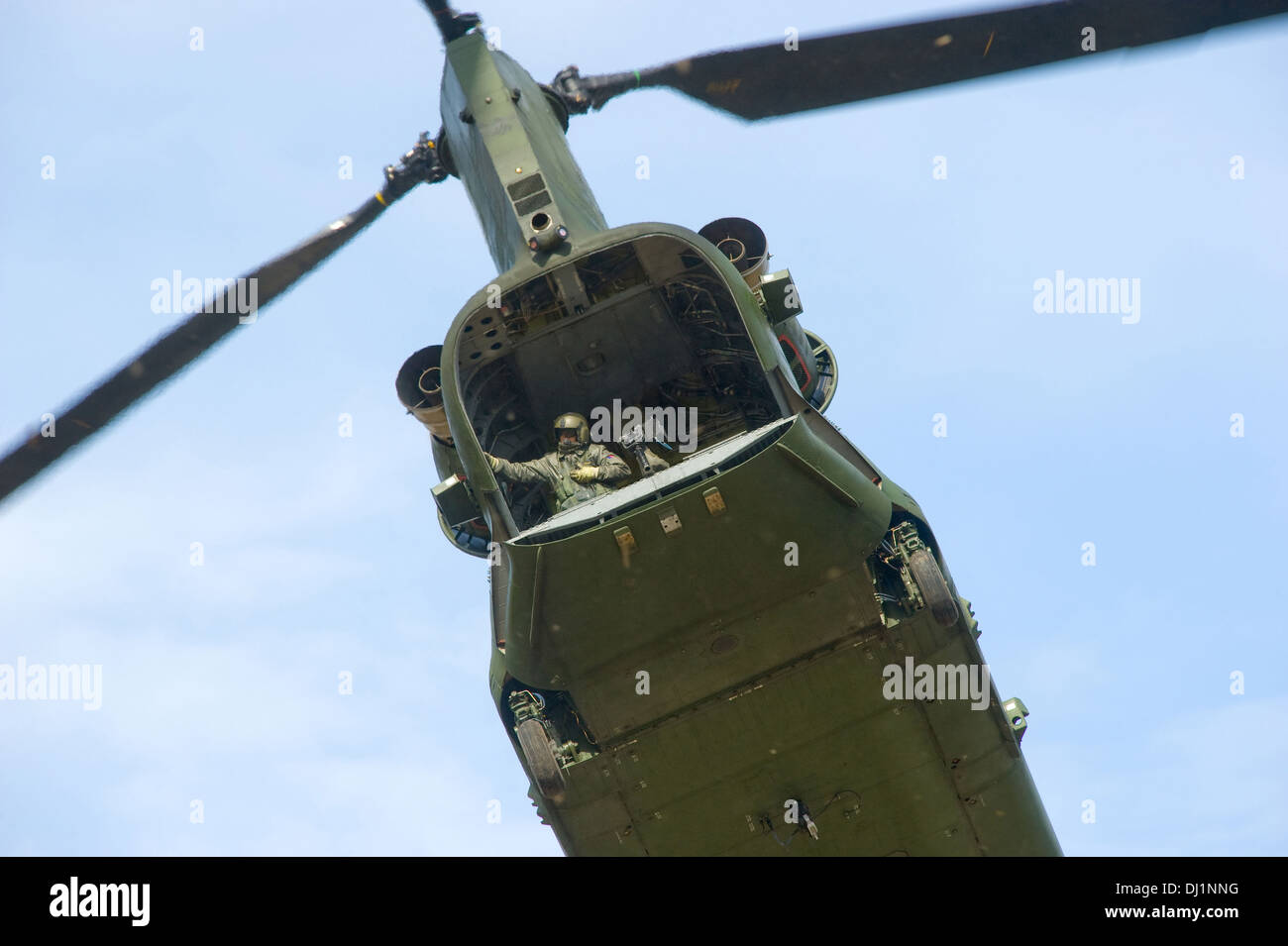 A chinook helicopter from the dutch air force just picked up some soldiers and took off Stock Photo