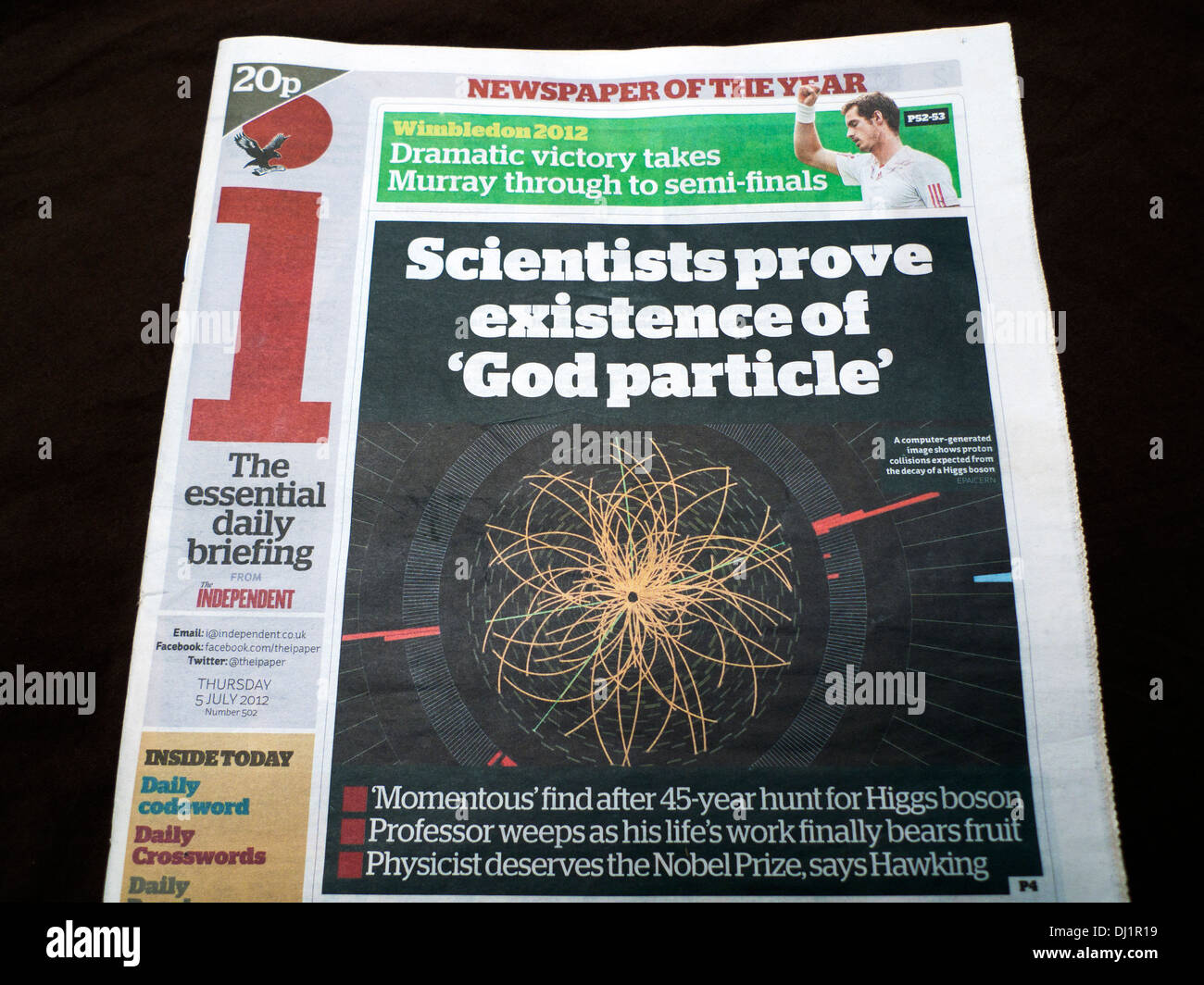 'Scientists prove existence of 'God Particle' ' i newspaper headline front page Higgs Boson science article 5 July 2012 London England UK Stock Photo