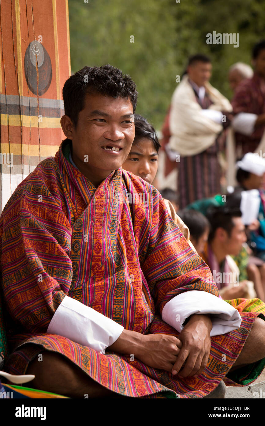 Bhutan, Thimpu Dzong, annual Tsechu, man with repaired cleft palate in audience Stock Photo