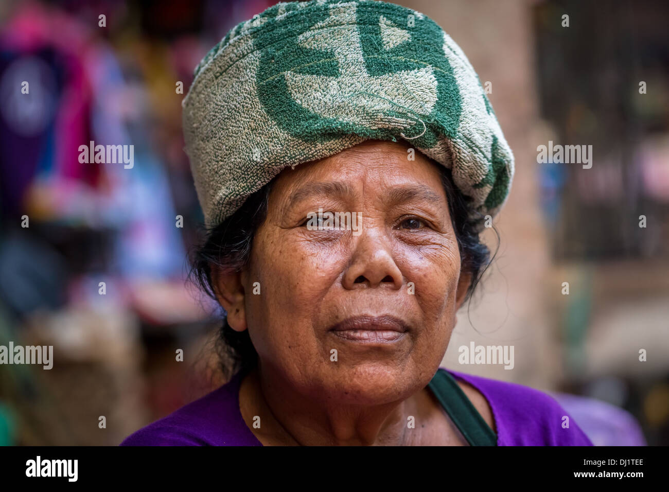 Elderly woman wearing a head scarf, Ubud district, Bali, Indonesia Stock Photo