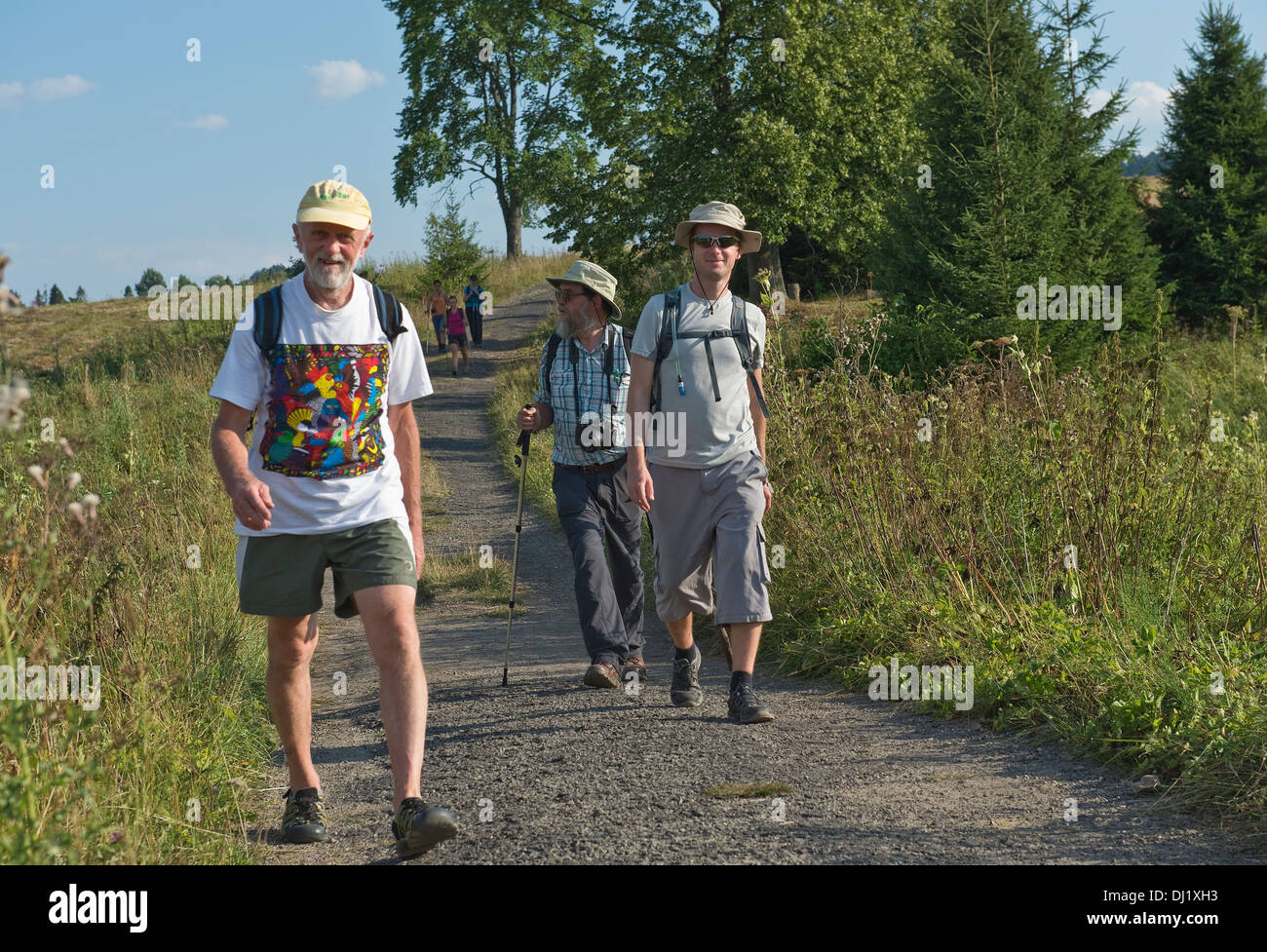 Tourist walking on the road near Beniowa Bieszczady National Park Subcarpathian Voivodeship south-eastern Poland Europe Stock Photo