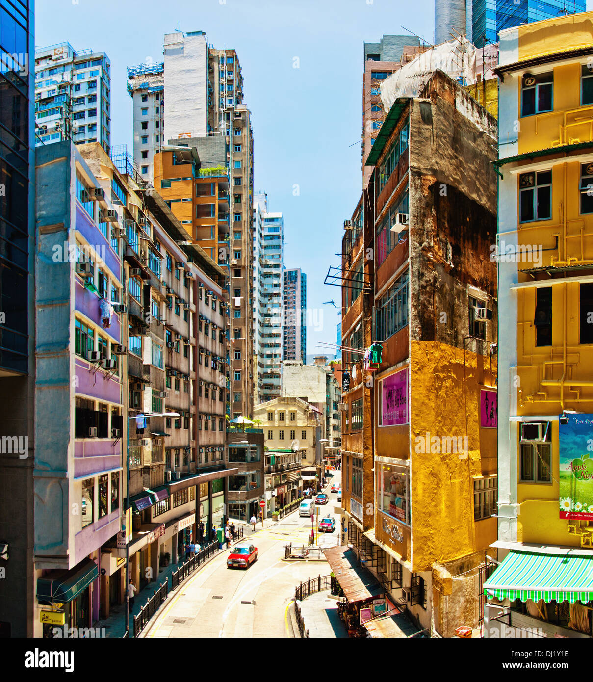Street view with taxi and buildings in Hong Kong, China. Stock Photo