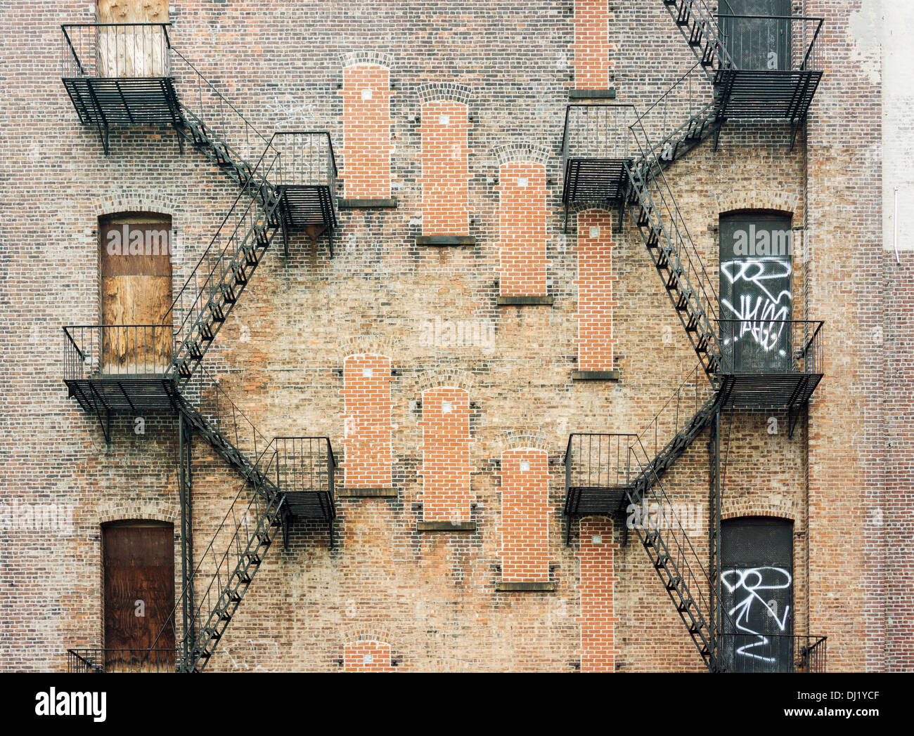 Fire escapes on the exterior rear of a commercial building in the Lower ...