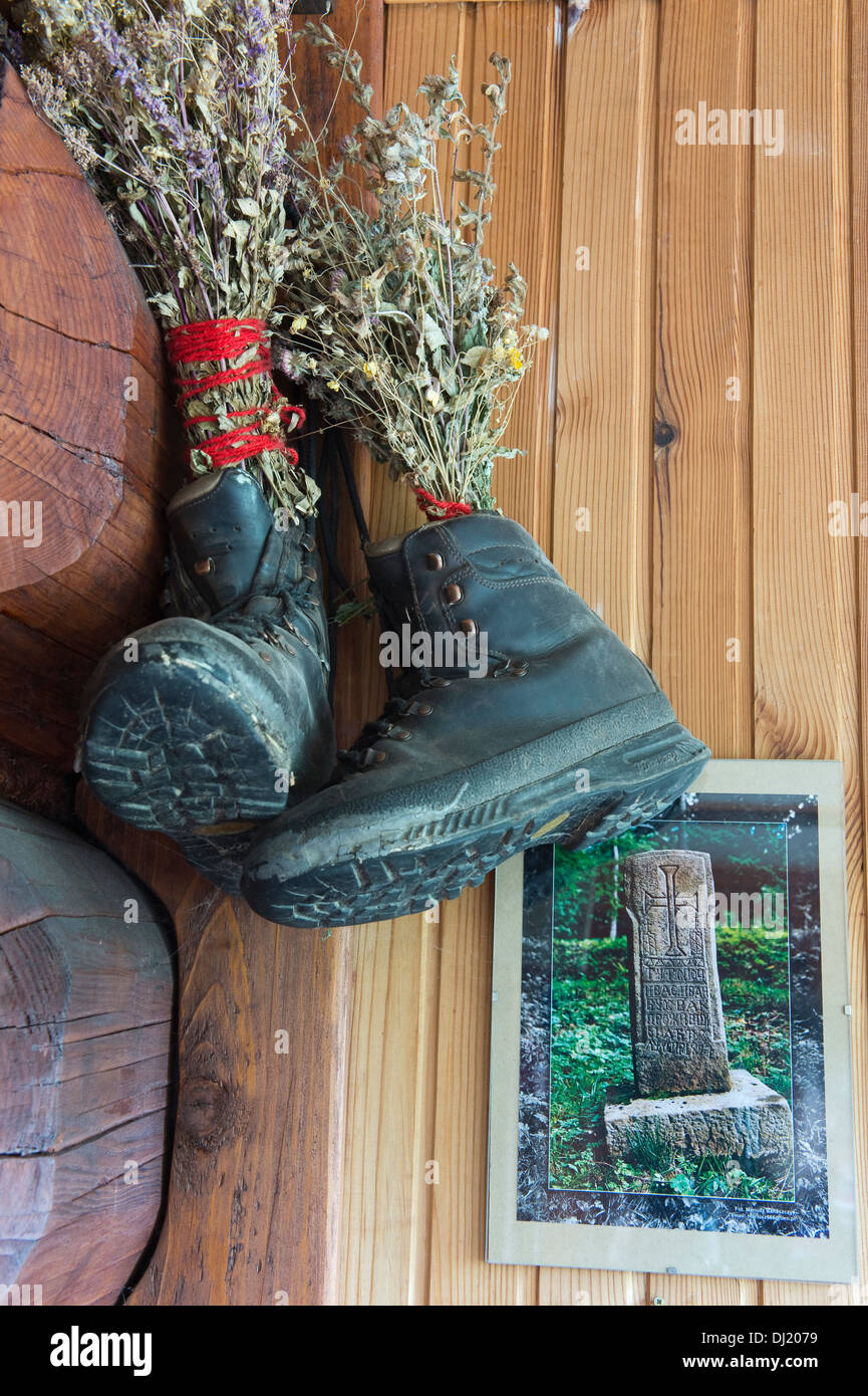 Walking boots with plants and photograph in Jaworzec PTTK Bieszczady south-eastern Poland Europe Stock Photo