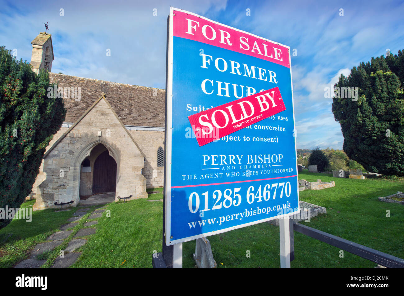 A 'For Sale' and 'Sold' sign on a church in Shortwood near Nailsworth, Gloucestershire UK Stock Photo