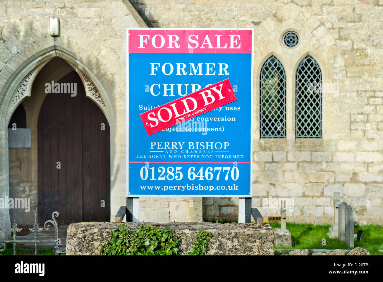 A 'For Sale' and 'Sold' sign on a church in Shortwood near Nailsworth