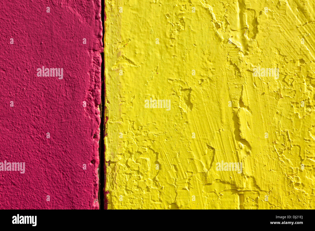 Vibrant yellow and pink wall background Stock Photo