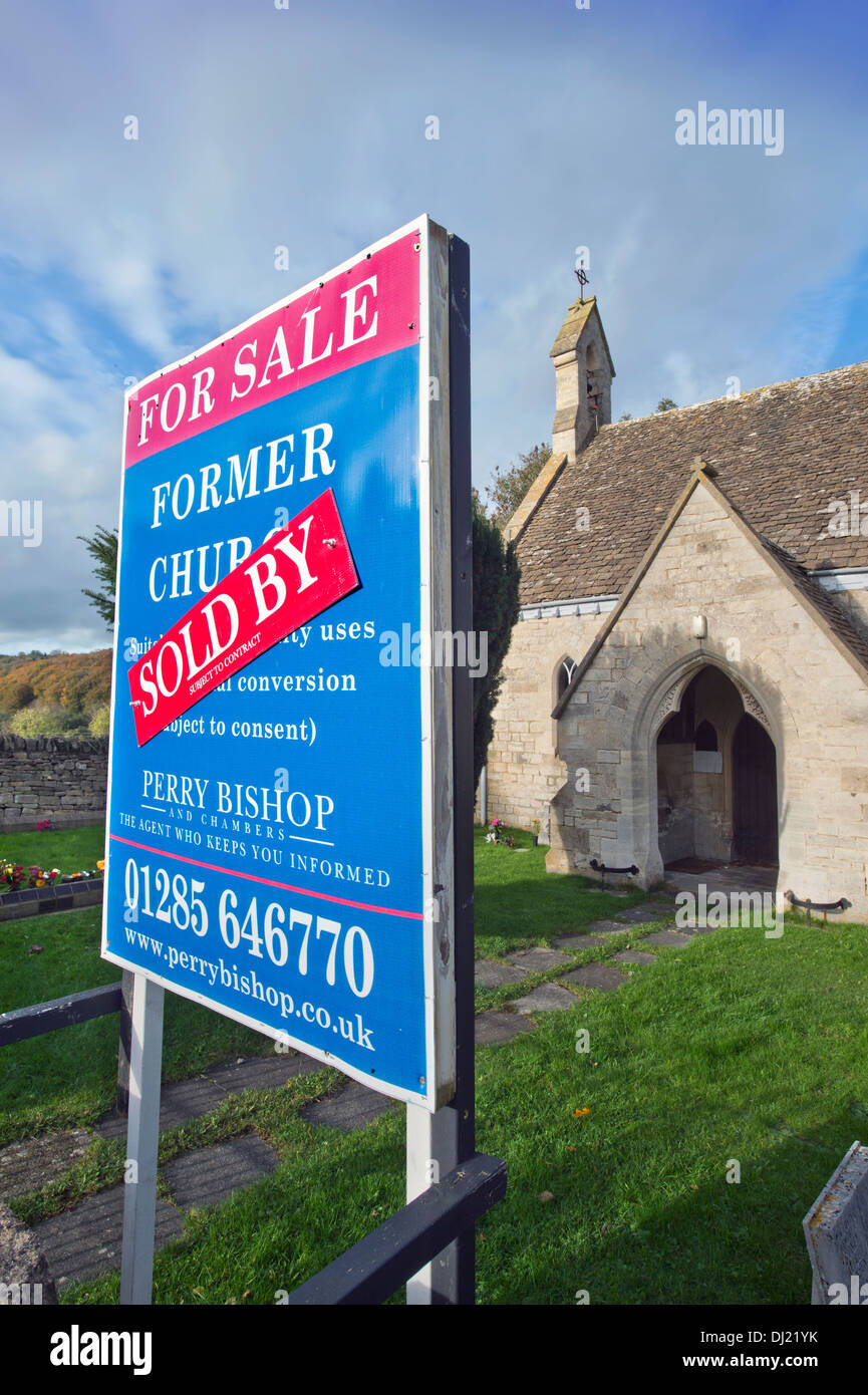A 'For Sale' and 'Sold' sign on a church in Shortwood near Nailsworth