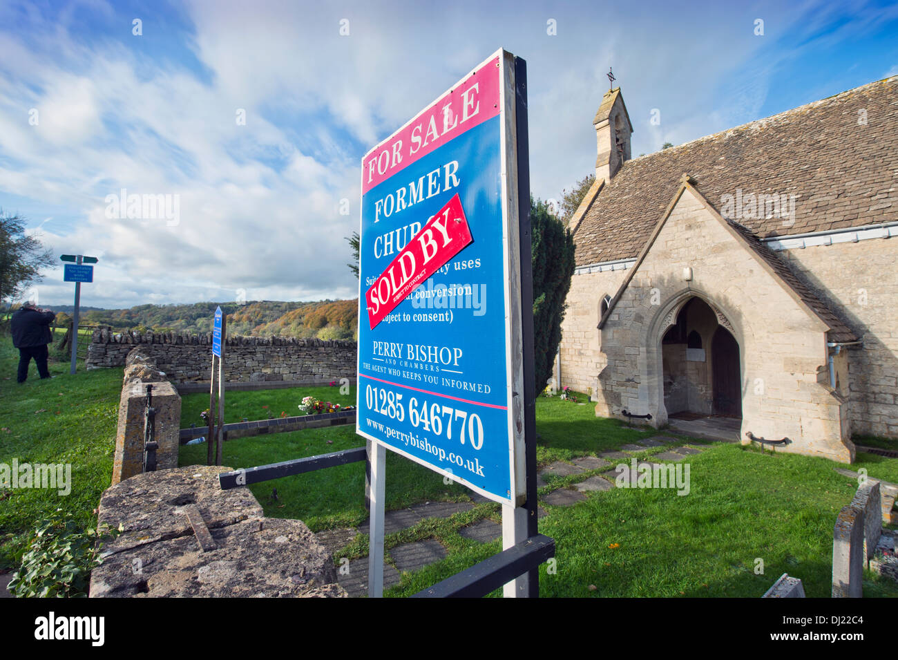 A 'For Sale' and 'Sold' sign on a church in Shortwood near Nailsworth, Gloucestershire UK Stock Photo
