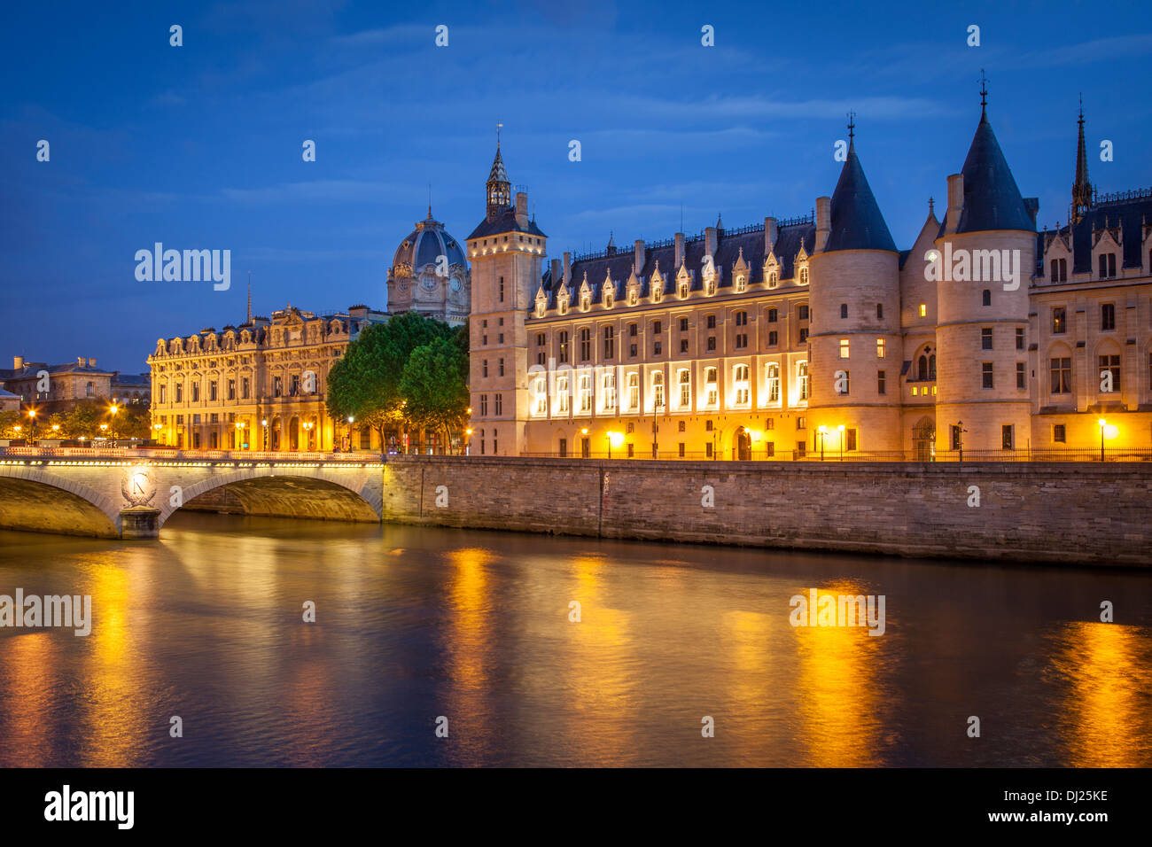 The Conciergerie along River Seine, Paris France Stock Photo