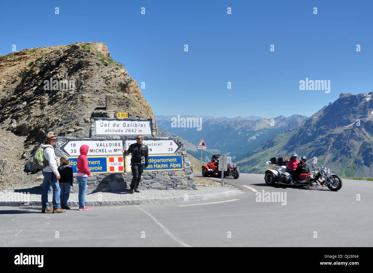 Tourists, Motorcyclists & Bikers at the Col du Galibier Mountain Pass between Savoie & Hautes-Alpes French Alps France Stock Photo