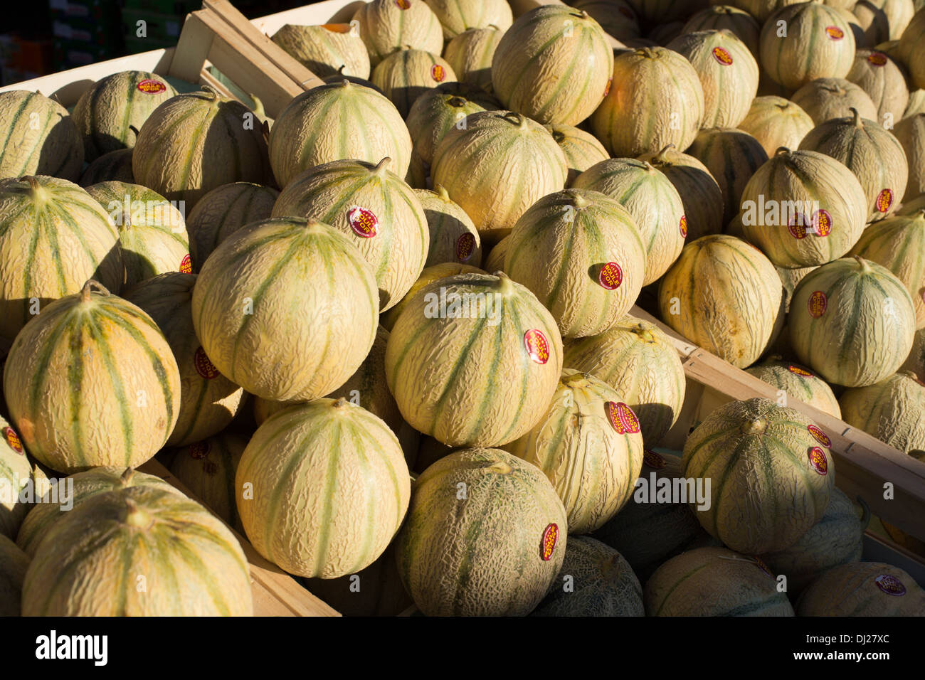Melons for sale at a traditional open air market Stock Photo