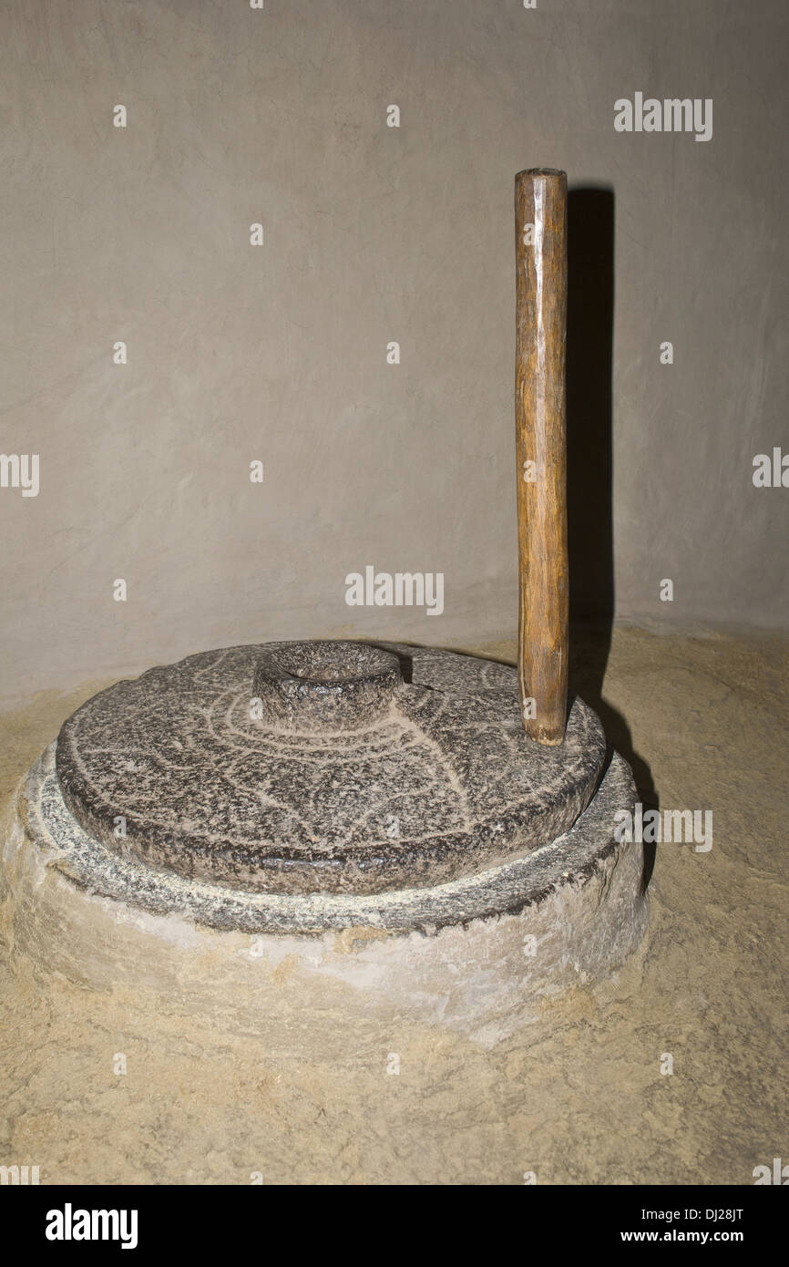 A traditional grinding stone for grain made of stone, Maharashtra