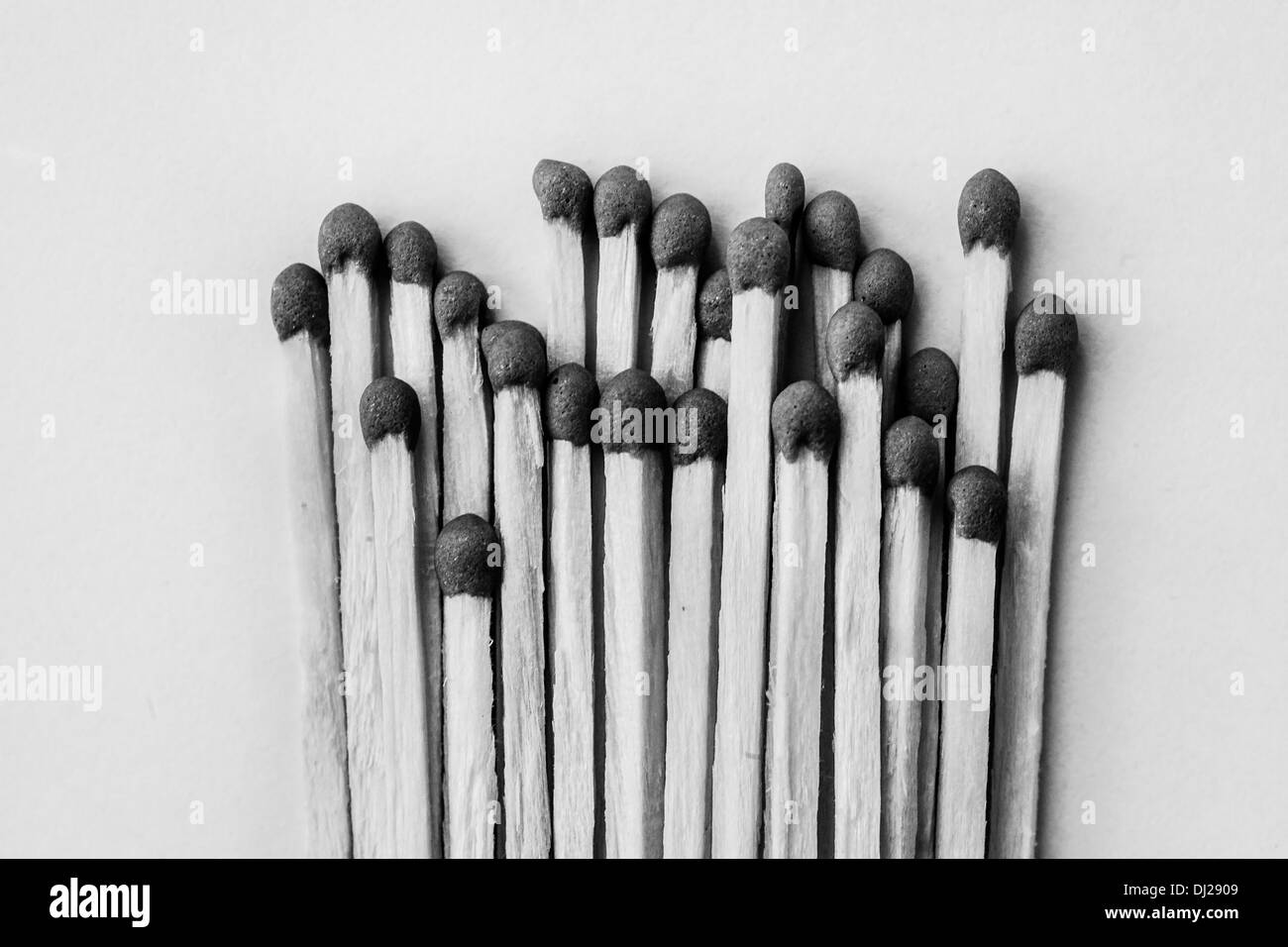A black and white photo of a set of matches on white background Stock