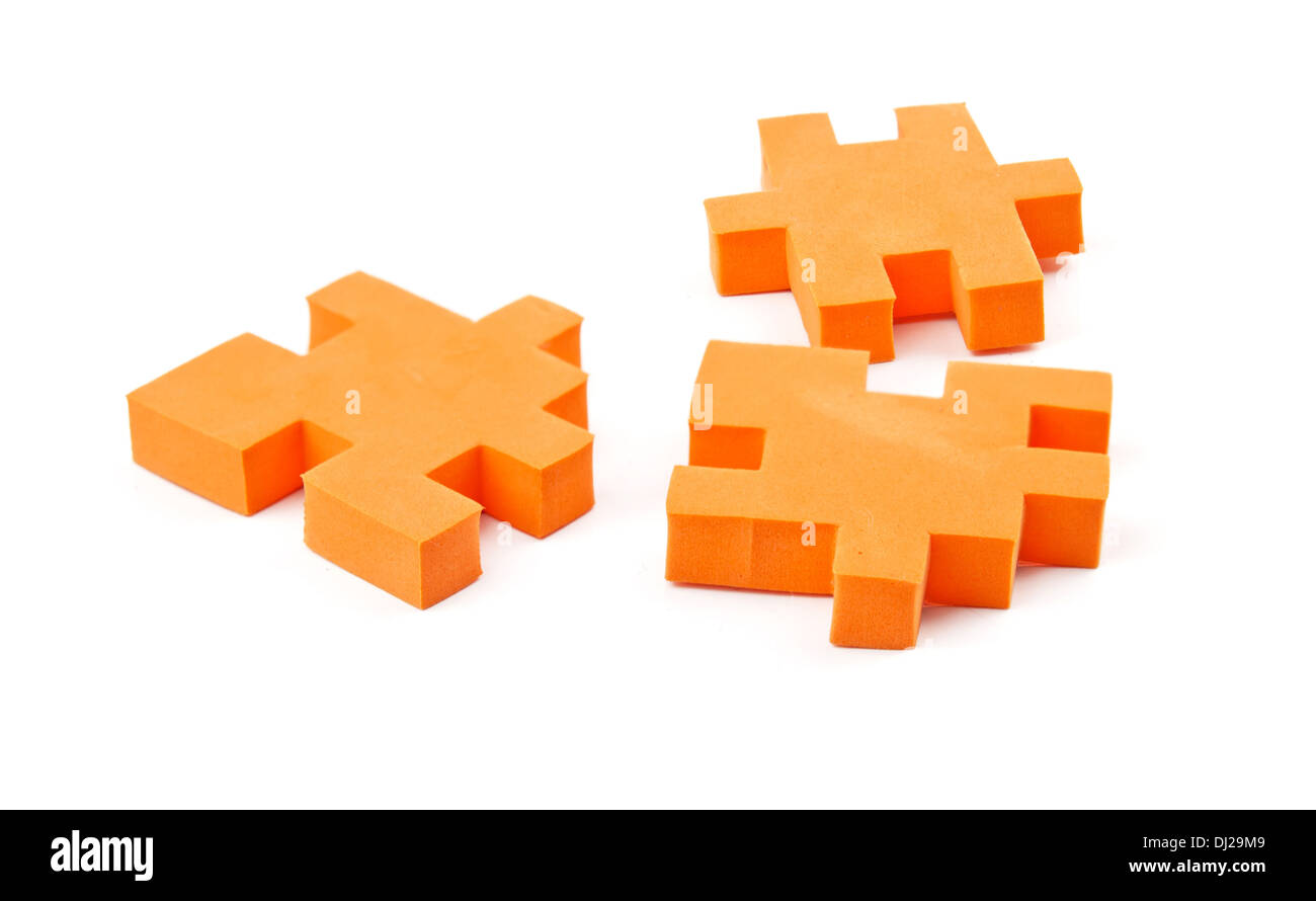 orange jigsaw puzzle pieces Stock Photo - Alamy