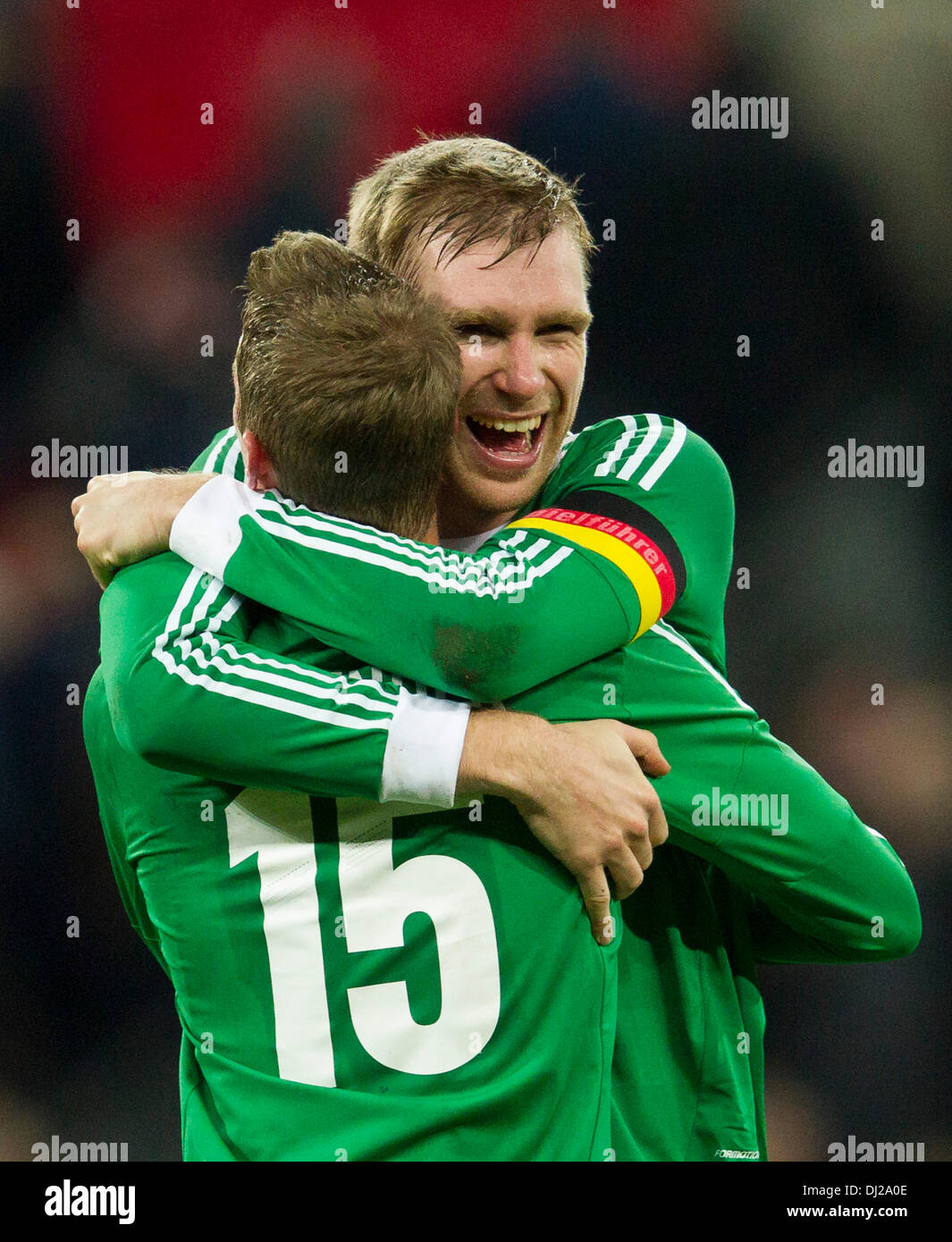London, UK. 19th Nov, 2013. Germany's Per MERTESACKER celebrates with Lars BENDER at the final whistle of the International football friendly game between England and Germany from Wembley Stadium. Credit:  Action Plus Sports/Alamy Live News Stock Photo