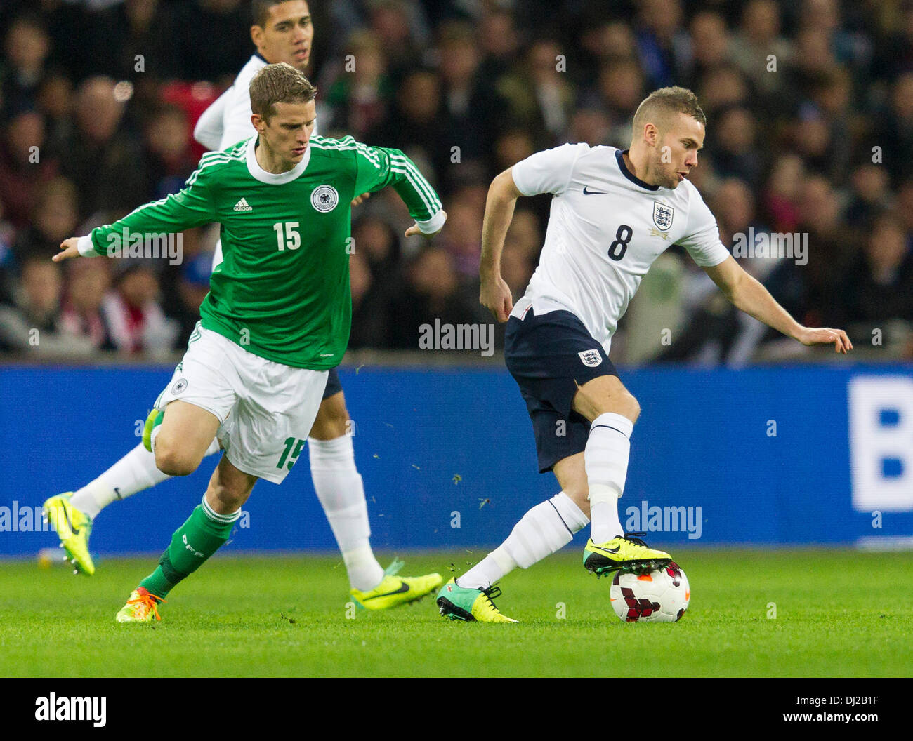London, UK. 19th Nov, 2013. England's Tom CLEVERLEY shields the ball from Germany's Lars BENDER during the International football friendly game between England and Germany from Wembley Stadium. Credit:  Action Plus Sports/Alamy Live News Stock Photo