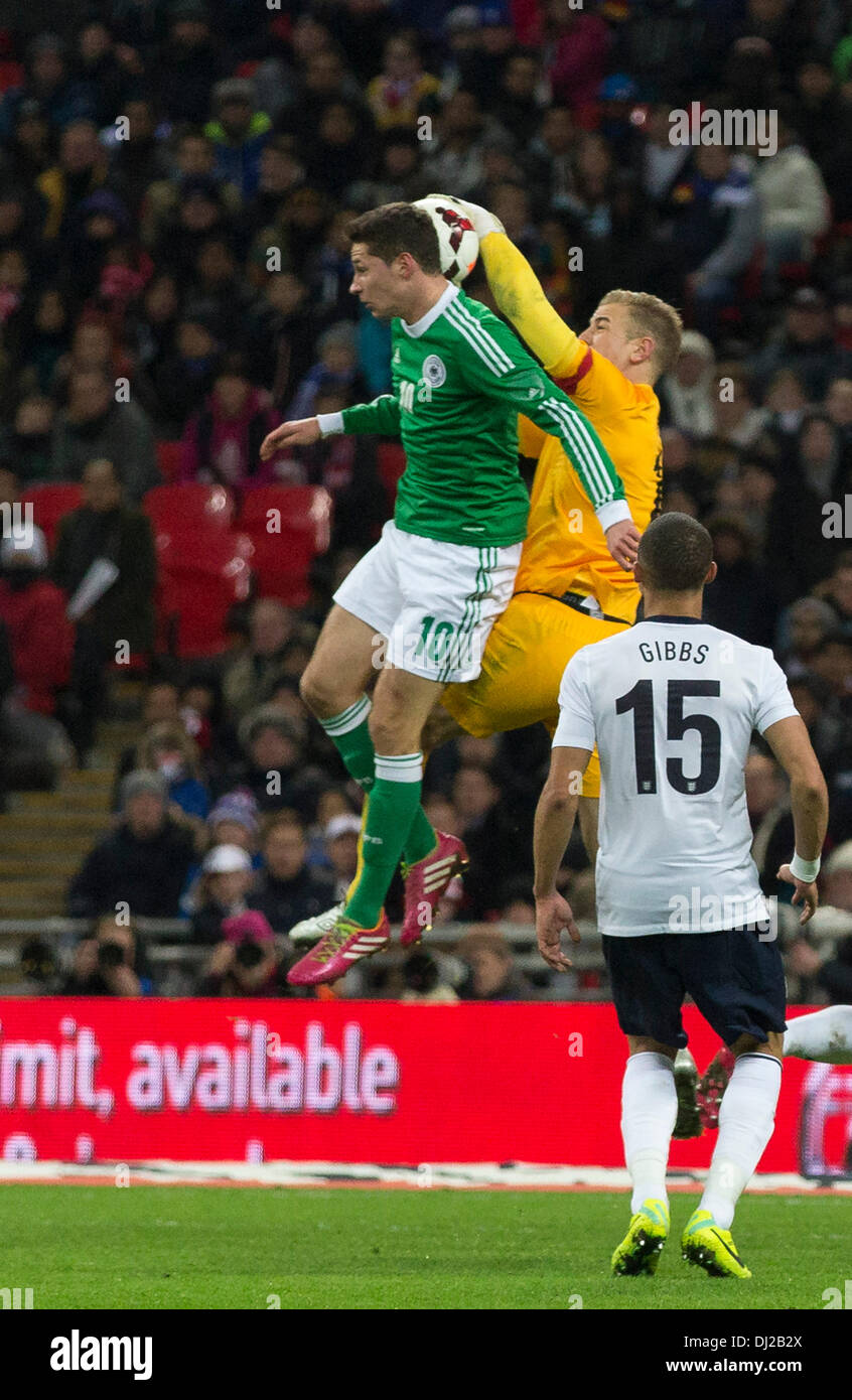 London, UK. 19th Nov, 2013. England's goalkeeper Joe HART competes for the ball with Germany's Julian DRAXLER during the International football friendly game between England and Germany from Wembley Stadium. Credit:  Action Plus Sports/Alamy Live News Stock Photo