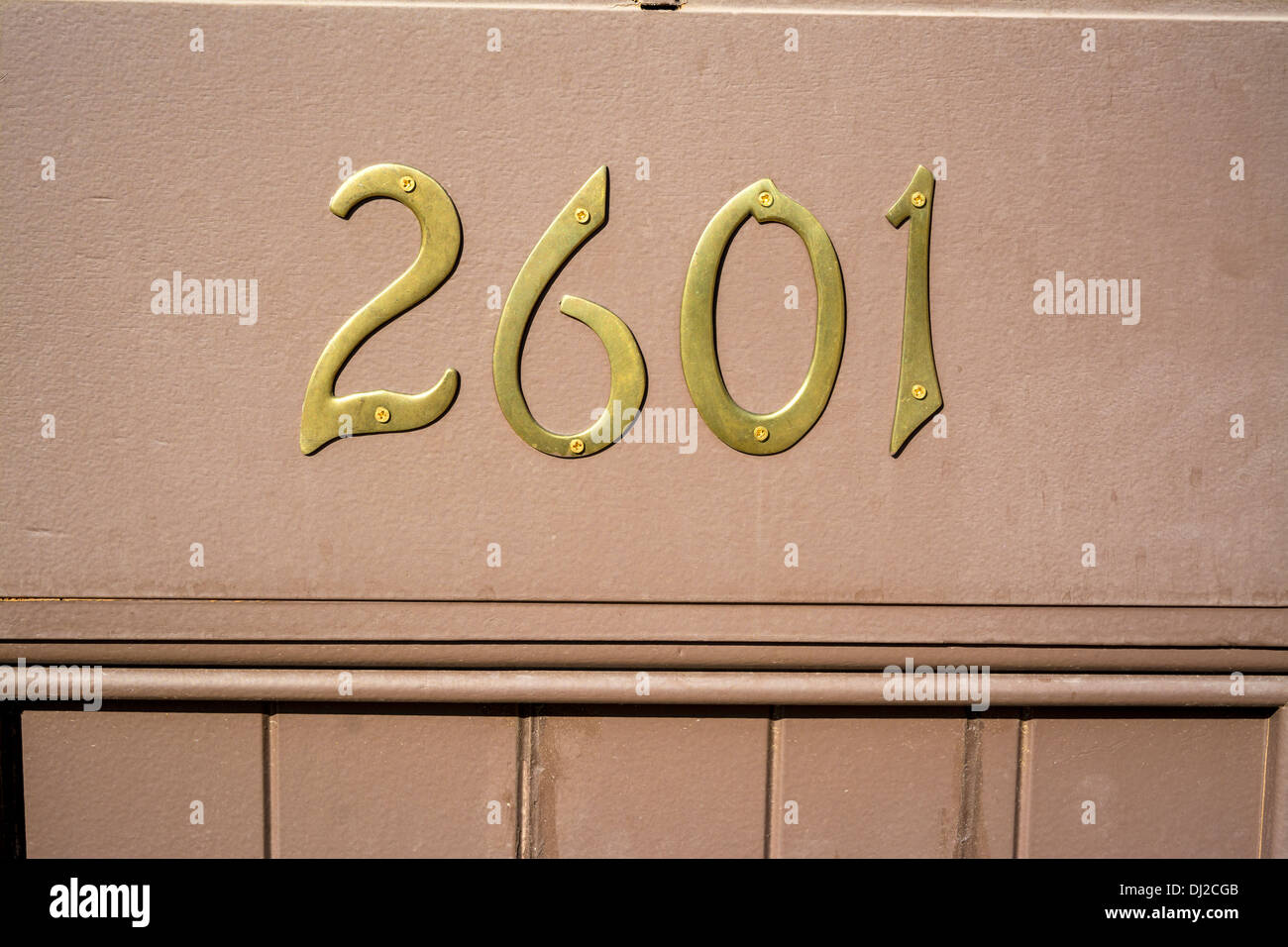 Brass numbers are the address of a building Stock Photo