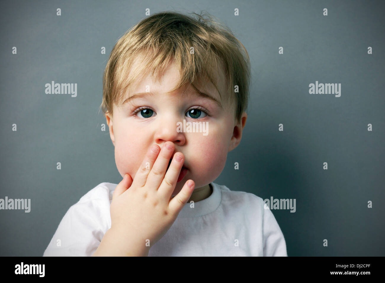 Child hand in front of face hires stock photography and images Alamy