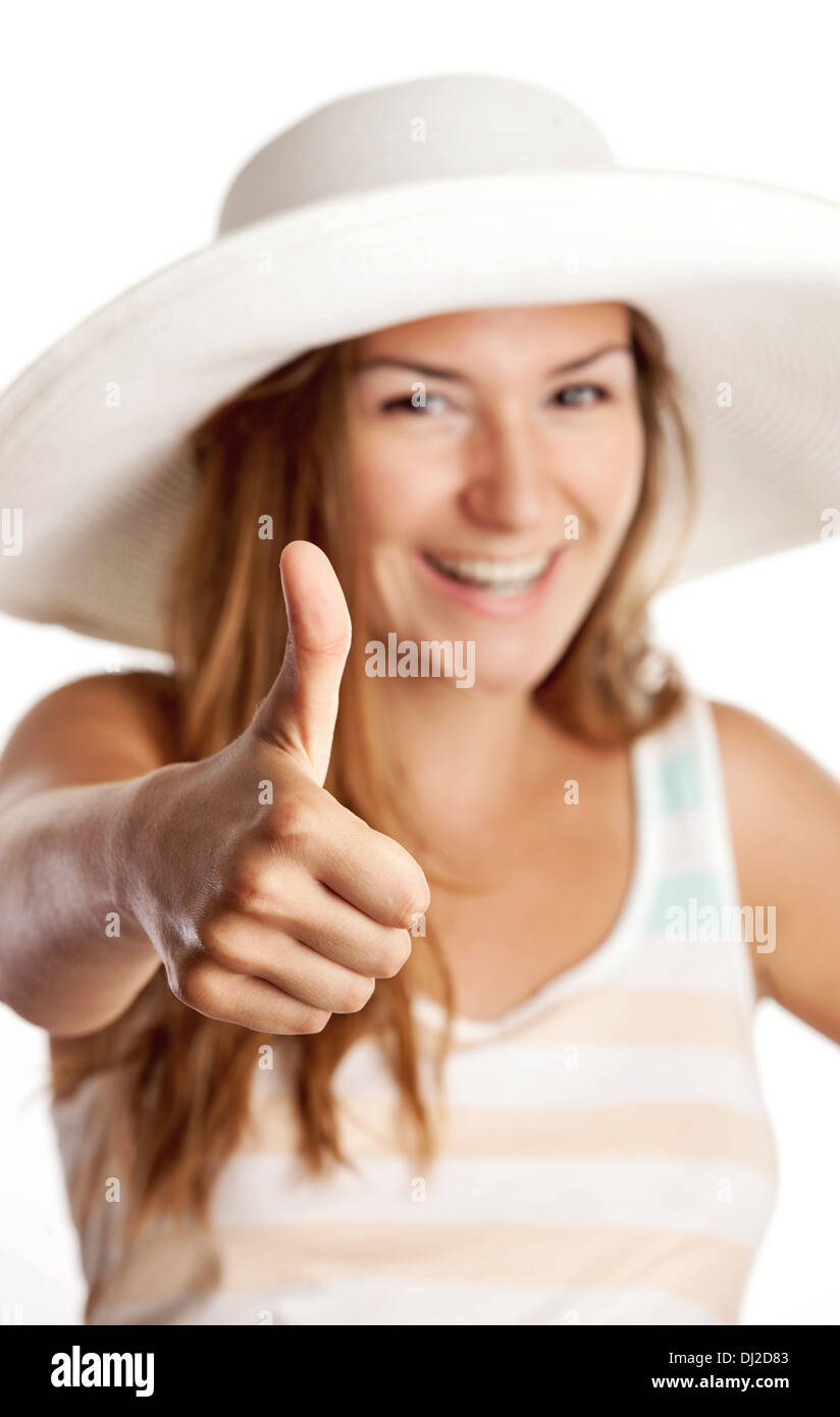 Pretty young girl smiling brightly and showing thumb up sign Stock ...