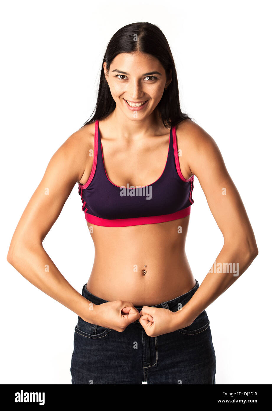 Cute fitness girl flexing bicep hi-res stock photography and