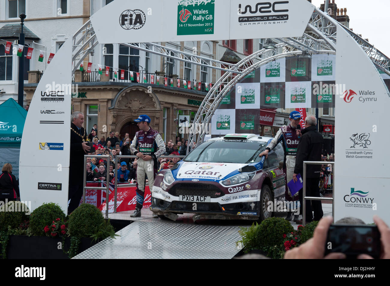 Wales Rally GB 2013 competitors at the winners rostrum Llandudno North Wales Stock Photo