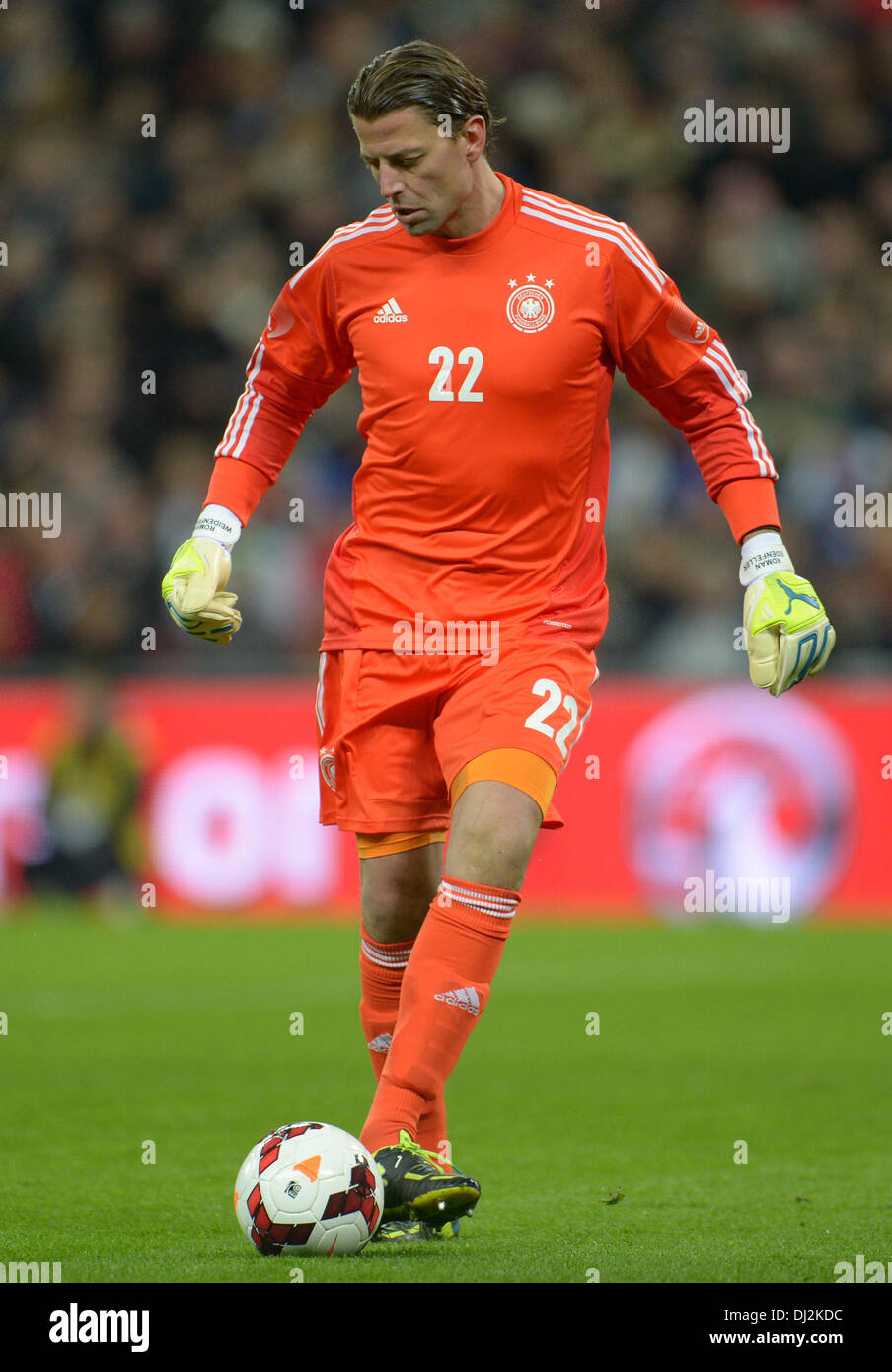 London, UK. 19th Nov, 2013. Germany's goalkeeper Roman Weidenfeller passes the ball during the friendly soccer match between England and Germany at Wembley Stadium in London, England, 19 November 2013. Photo: Andreas Gebert/dpa/Alamy Live News Stock Photo