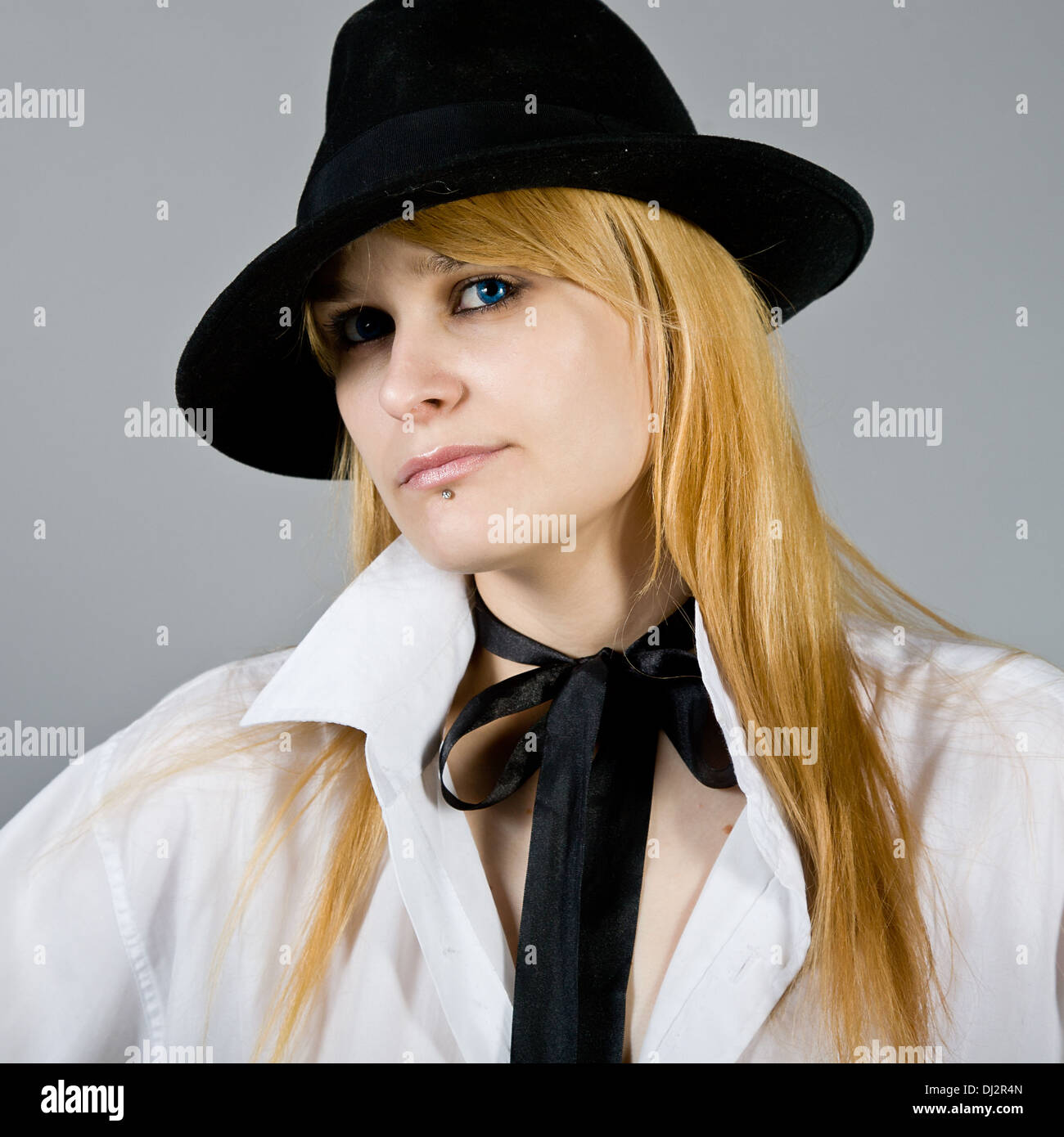 girl in a black hat Stock Photo - Alamy