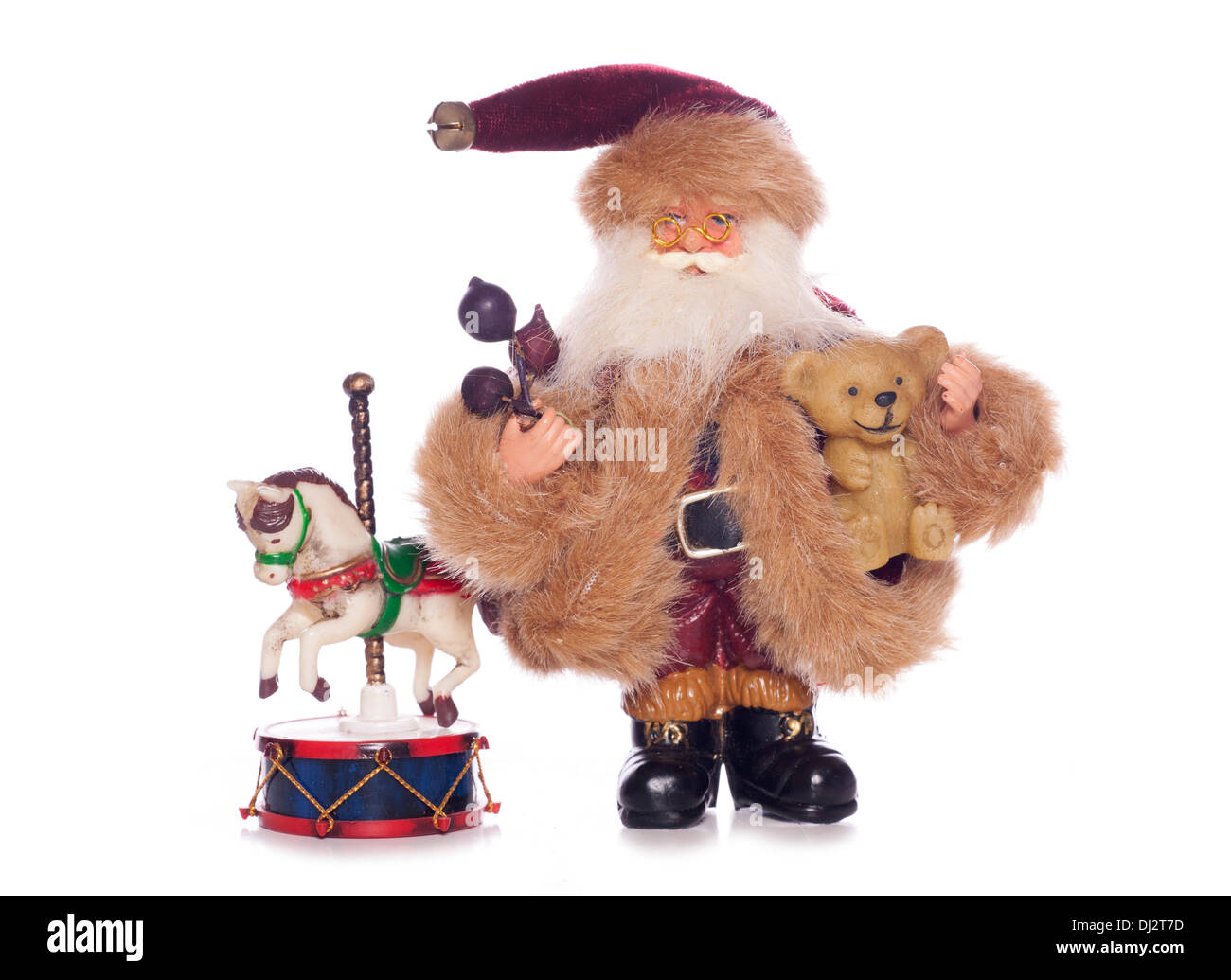 Vintage father christmas with old toys cutout Stock Photo