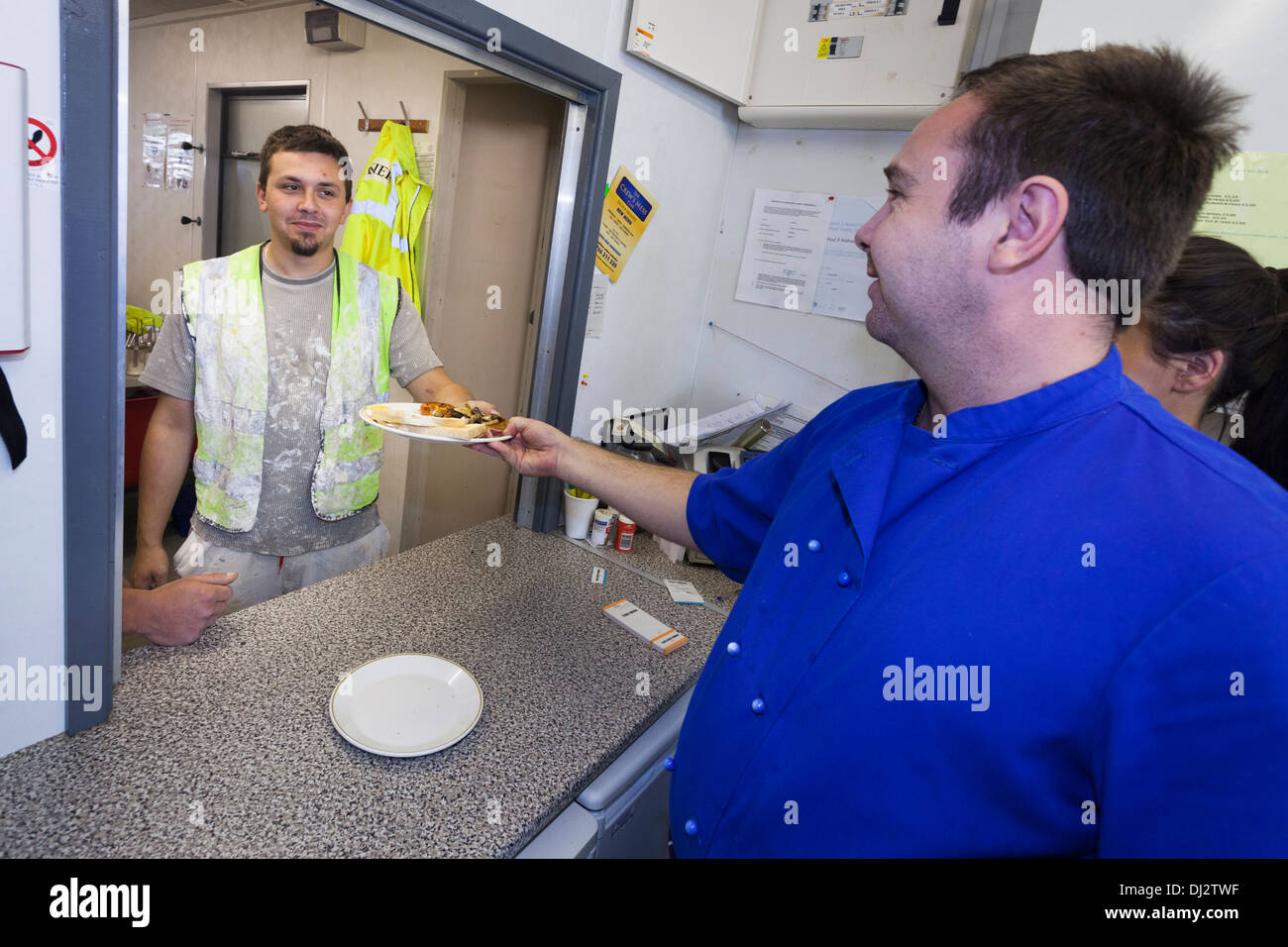 Construction workers food onsite canteen hires stock photography and