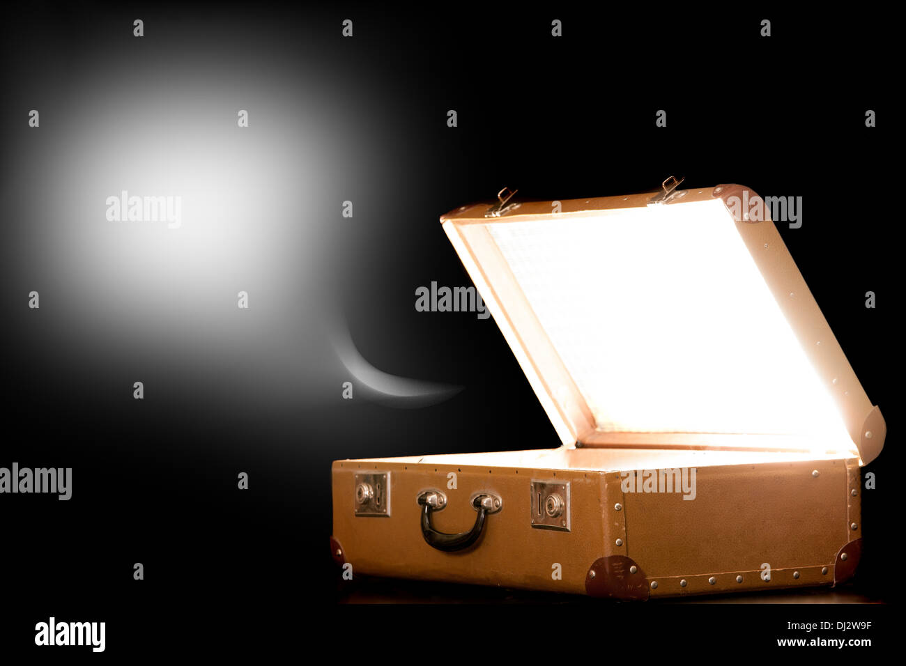 Open suitcase on black background Stock Photo