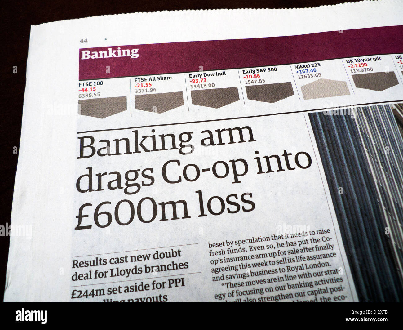 'Banking arm drags Co-op into £600m loss' newspaper article in Guardian 2013 London UK Stock Photo