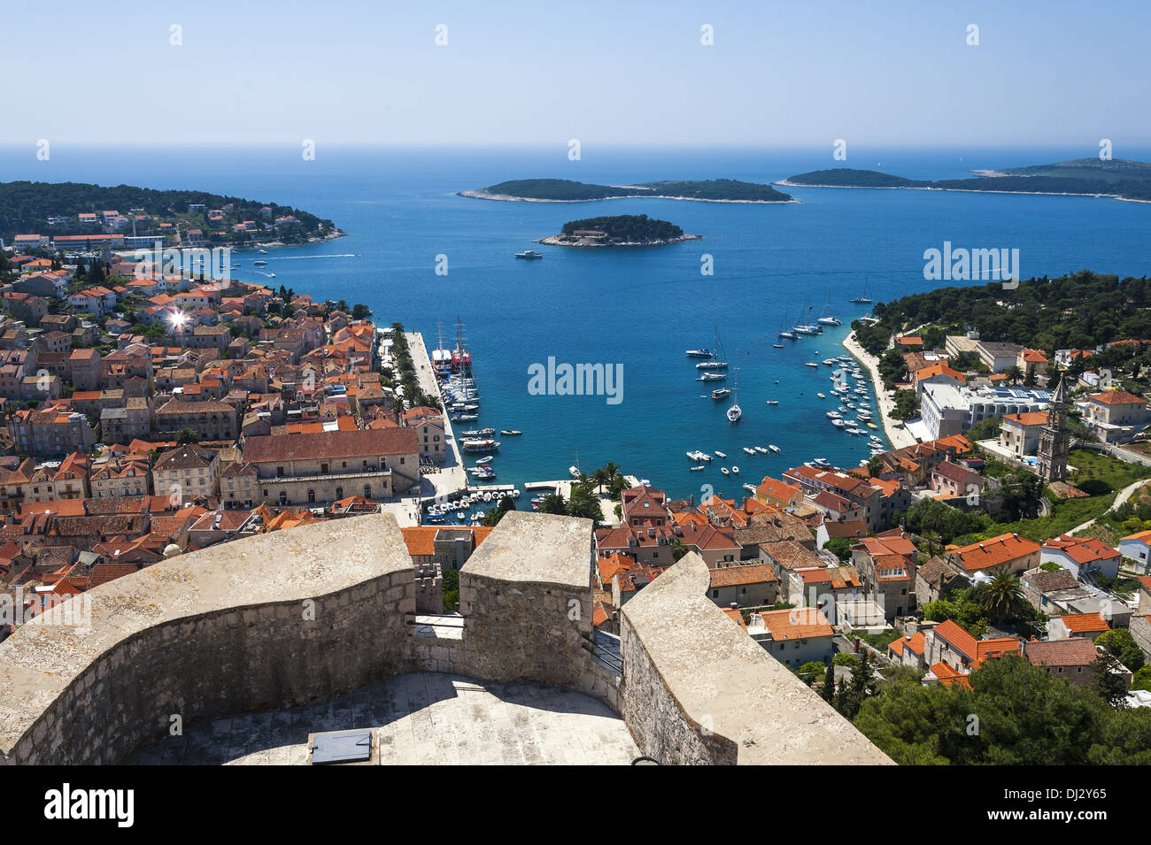 high above the town and port of Hvar Stock Photo