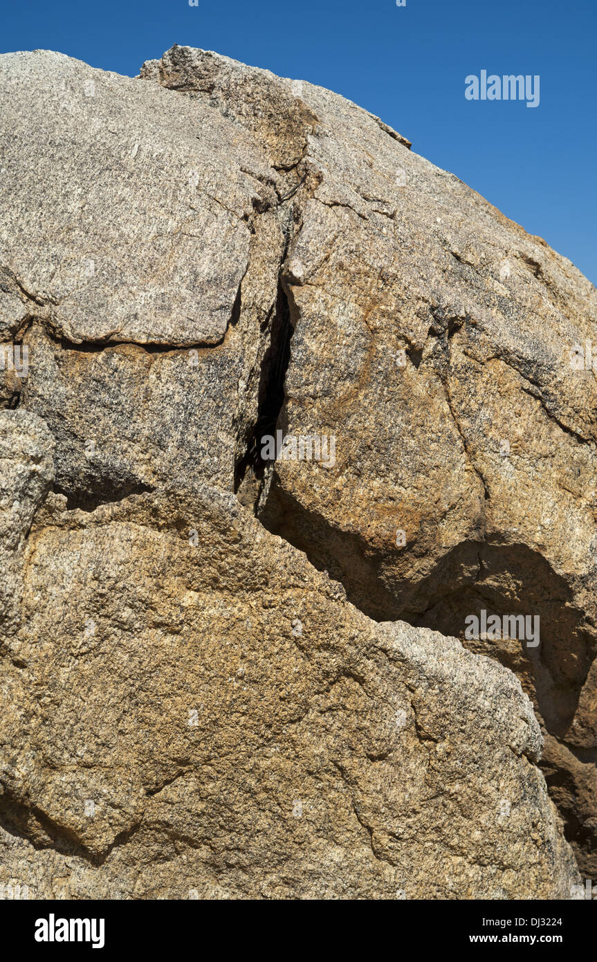 Crack in a granite boulder Stock Photo