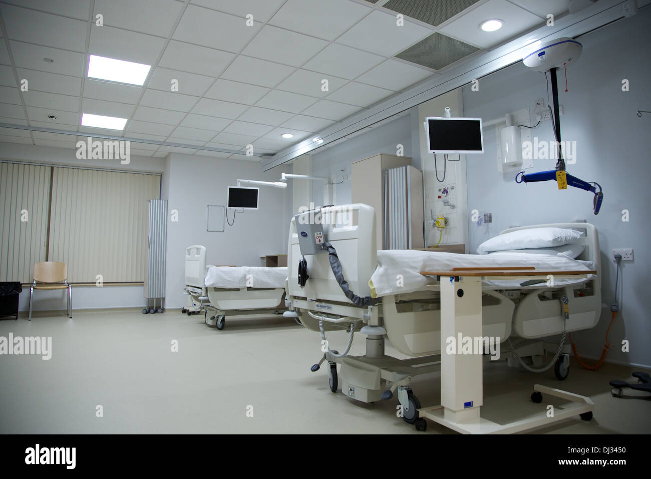 Brand new NHS Hospital Ward with beds and equipment Stock Photo