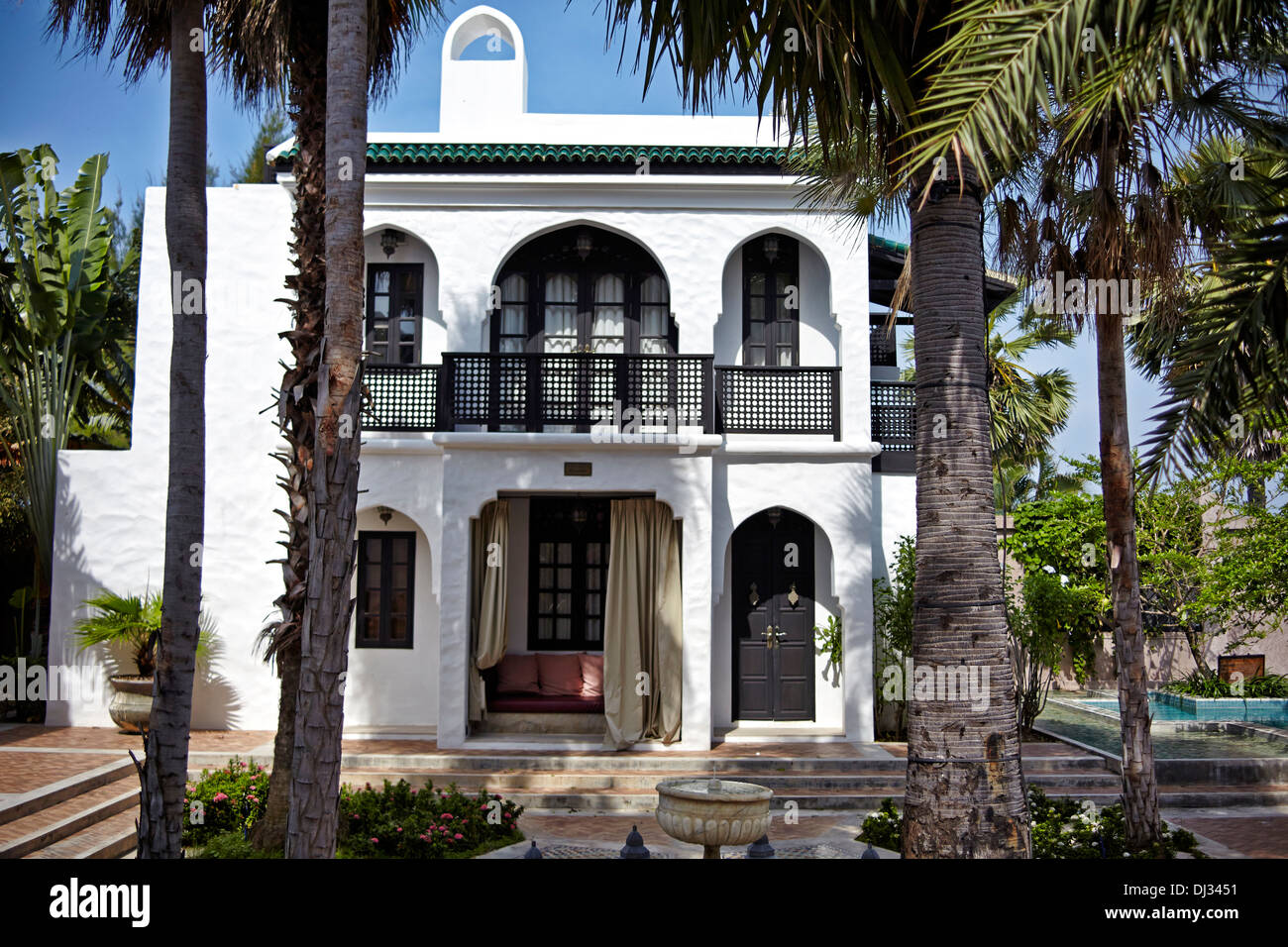 Tropical Villa exterior. Moroccan styled luxury villa and gardens