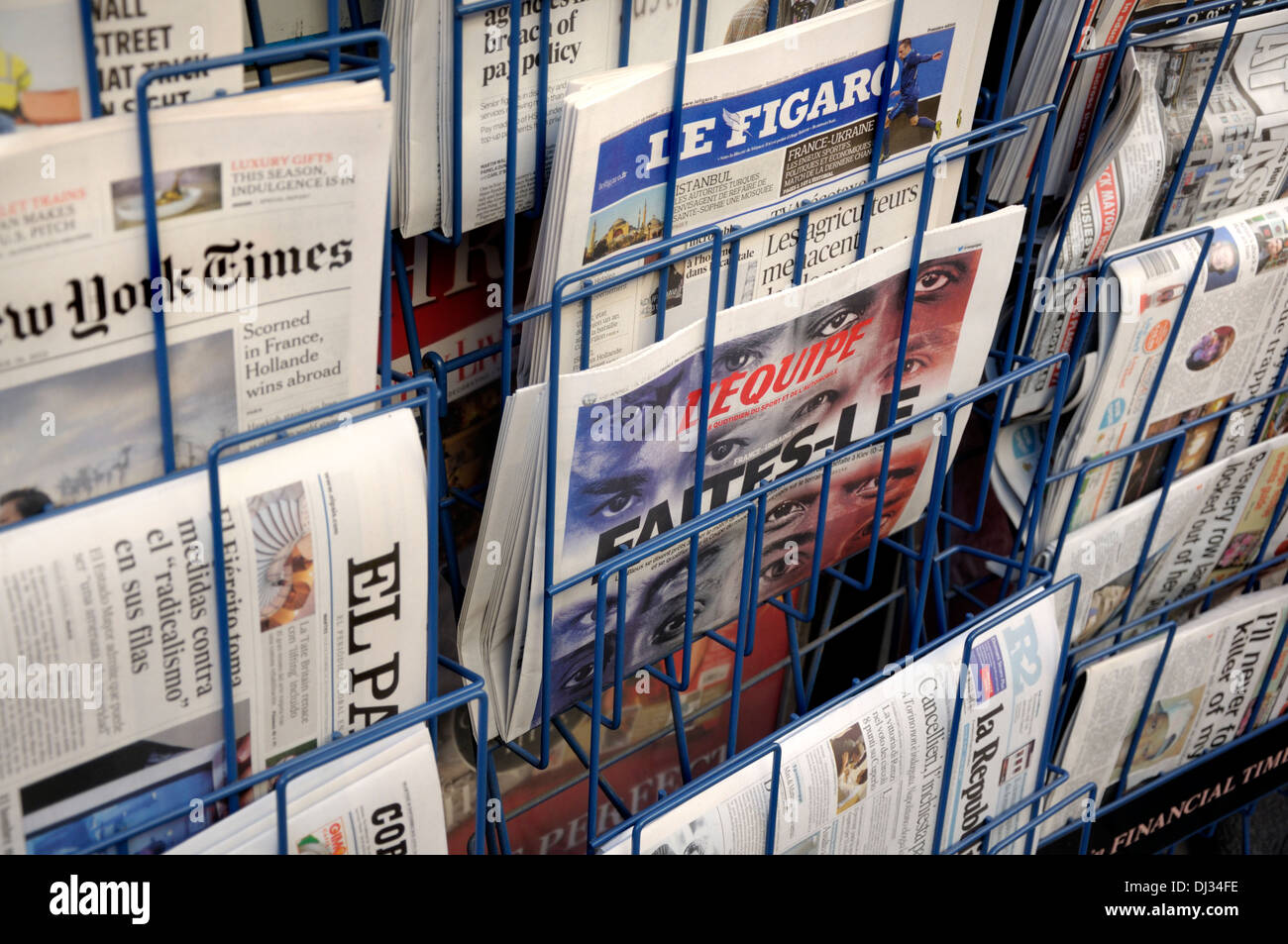 London England UK International Newspapers In A Rack Outside Newsagent Stock Photo Alamy