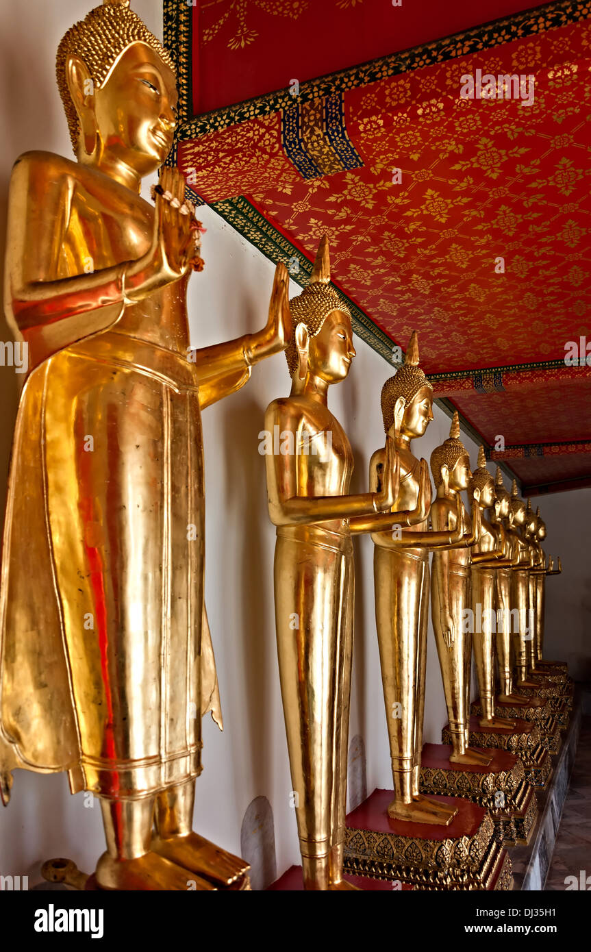 Buddha golden statues in Wat Pho temple, Bangkok, Thailand Stock Photo ...