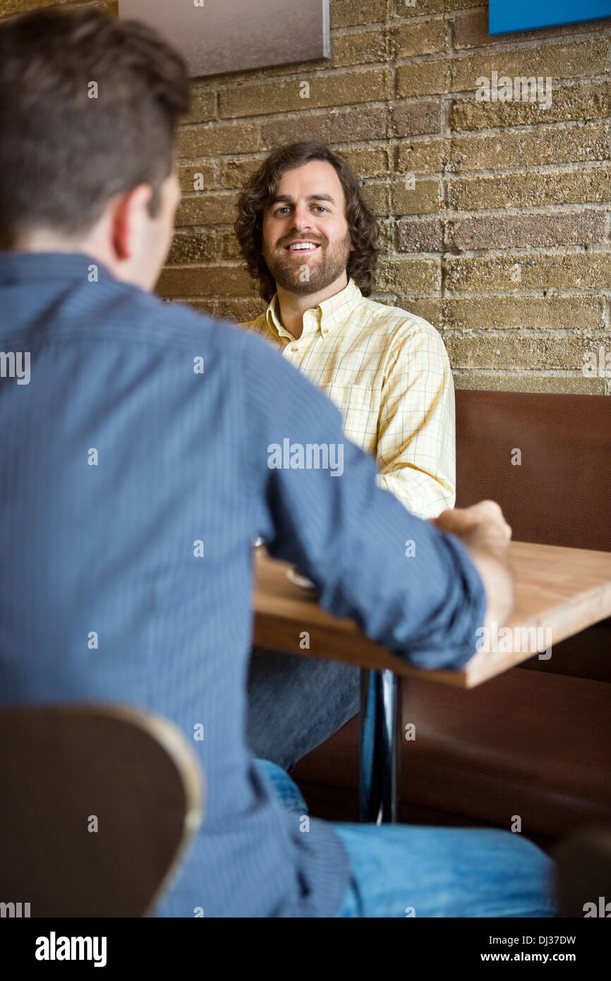 Sitting at bar rear view hi-res stock photography and images - Alamy