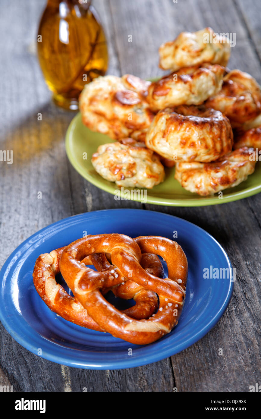 Soft newly-baked rolls on an old kitchen table Stock Photo