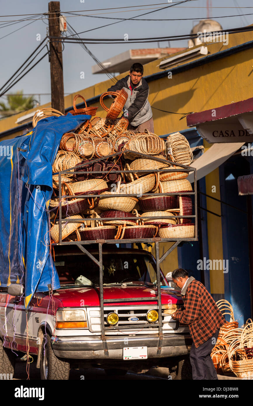 Basket makers deliver their wares at the Benito Juarez Market in Oaxaca, Mexico. Stock Photo