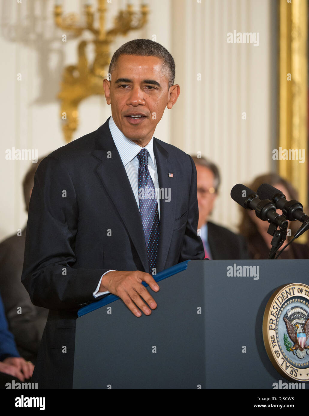 US President Barack Obama gives remarks before the Presidential Medal of Freedom ceremony at the White House November 20, 2013 in Washington, DC. Stock Photo