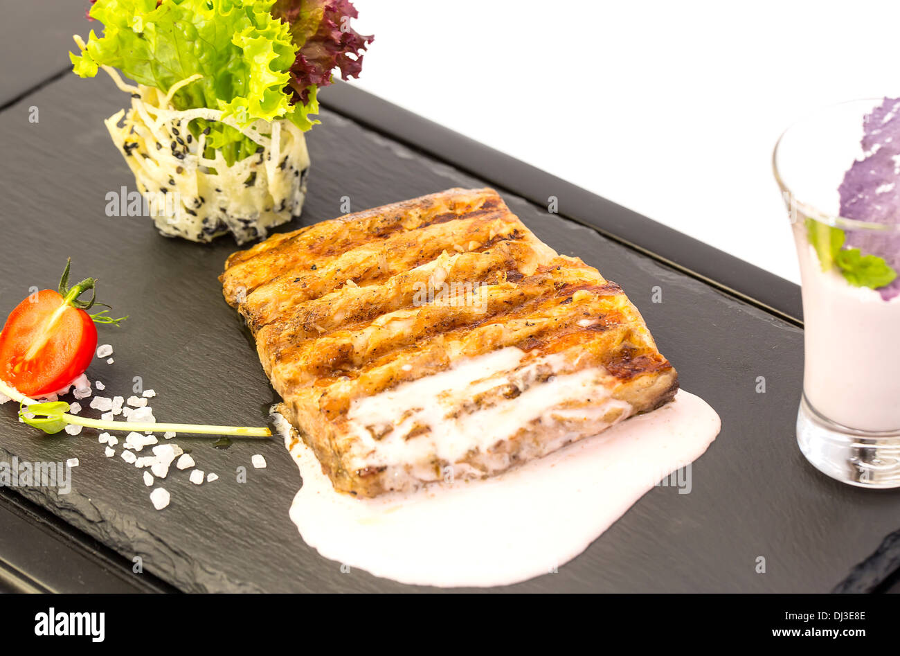 Catfish steak cooked on the grill Stock Photo Alamy