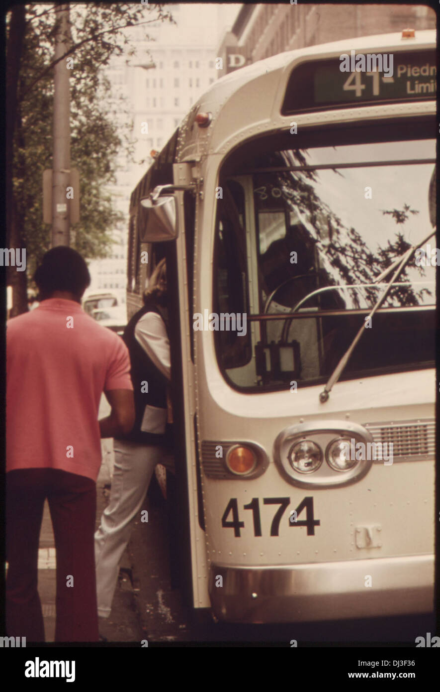 Passengers board a Metropolitan Atlanta Rapid Transit Authority (MARTA) Bus in downtown Atlanta, Georgia. In 1974 the . 793 Stock Photo