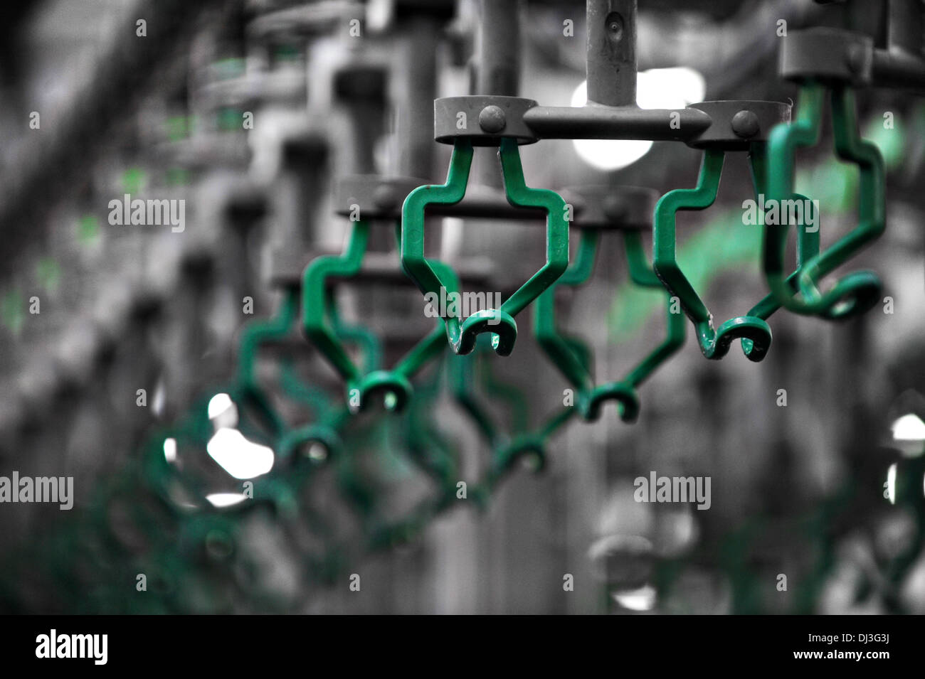 Empty hooks in a poultry meat processing factory Stock Photo